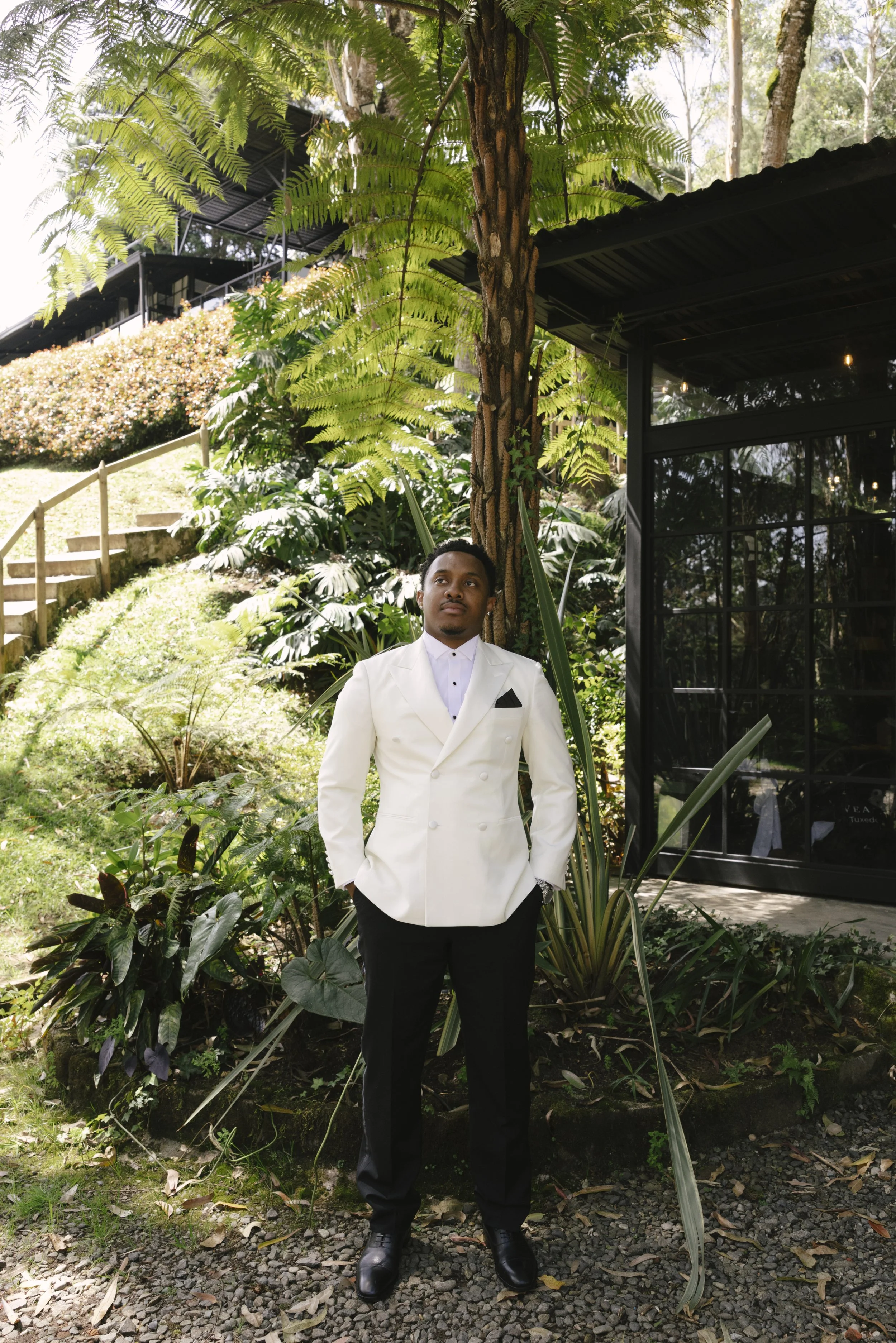 Destination wedding groom portraits at Forest Campestre in Medellín, Colombia featuring modern wedding attire, groomsmen portraits, formal wedding party photos, and documentary wedding photography