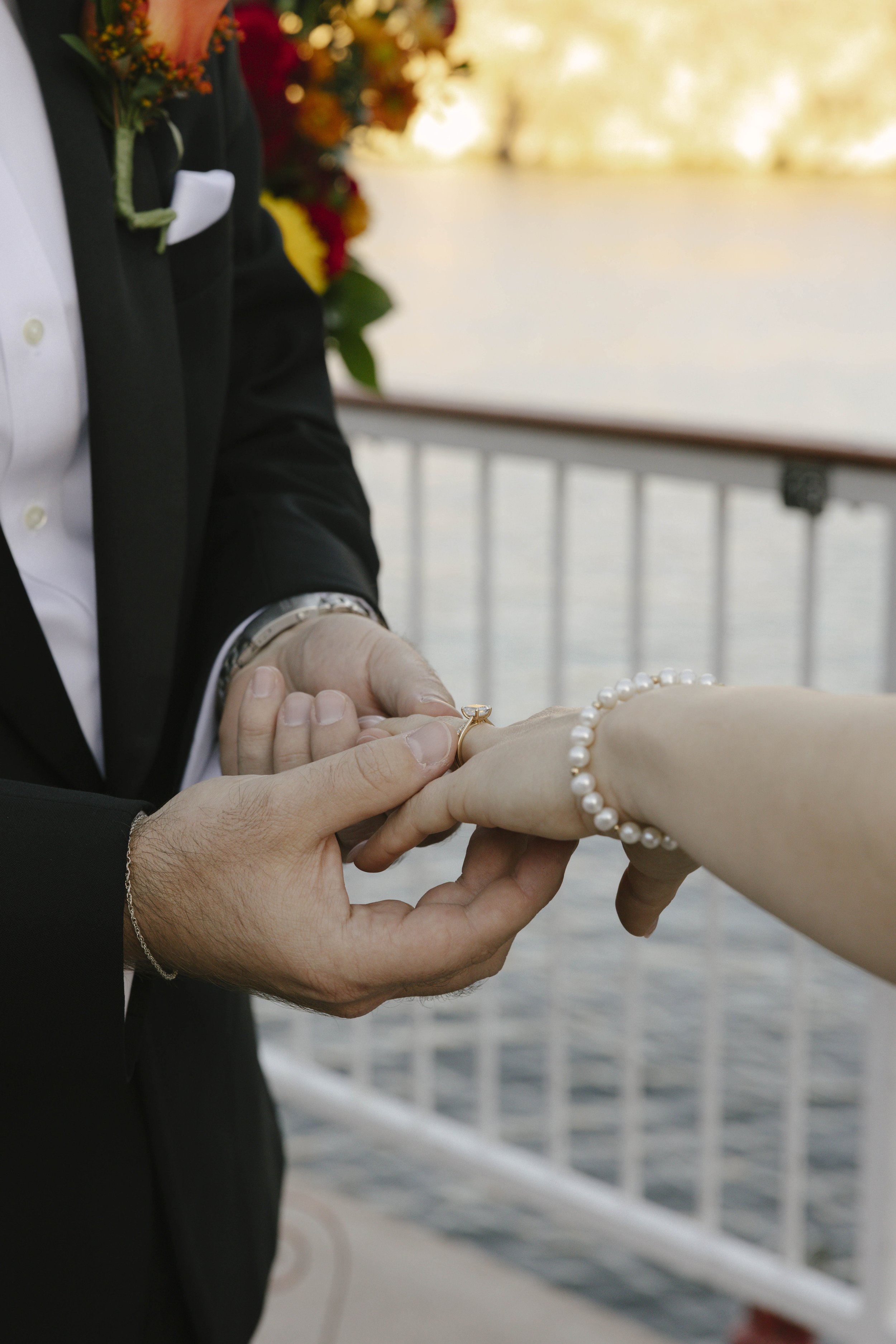 With Canyon Lake’s towering desert cliffs surrounding them, the couple exchanged rings and said “I do” aboard the Dolly Steamboat. Surrounded by about 60 of their closest friends and family, the ceremony took place on the deck with breathtaking Arizo
