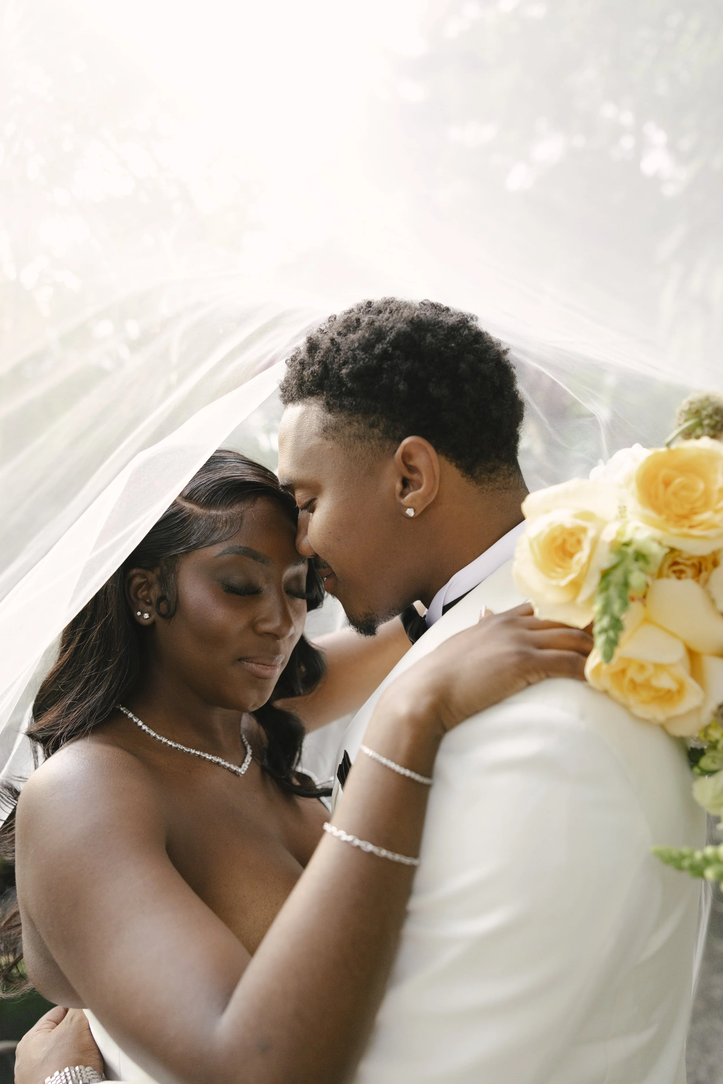 Bride and groom portraits at Forest Campestre in Medellín, Colombia featuring romantic destination wedding photography, lush tropical gardens, bridal party portraits, and natural, documentary-style moments.