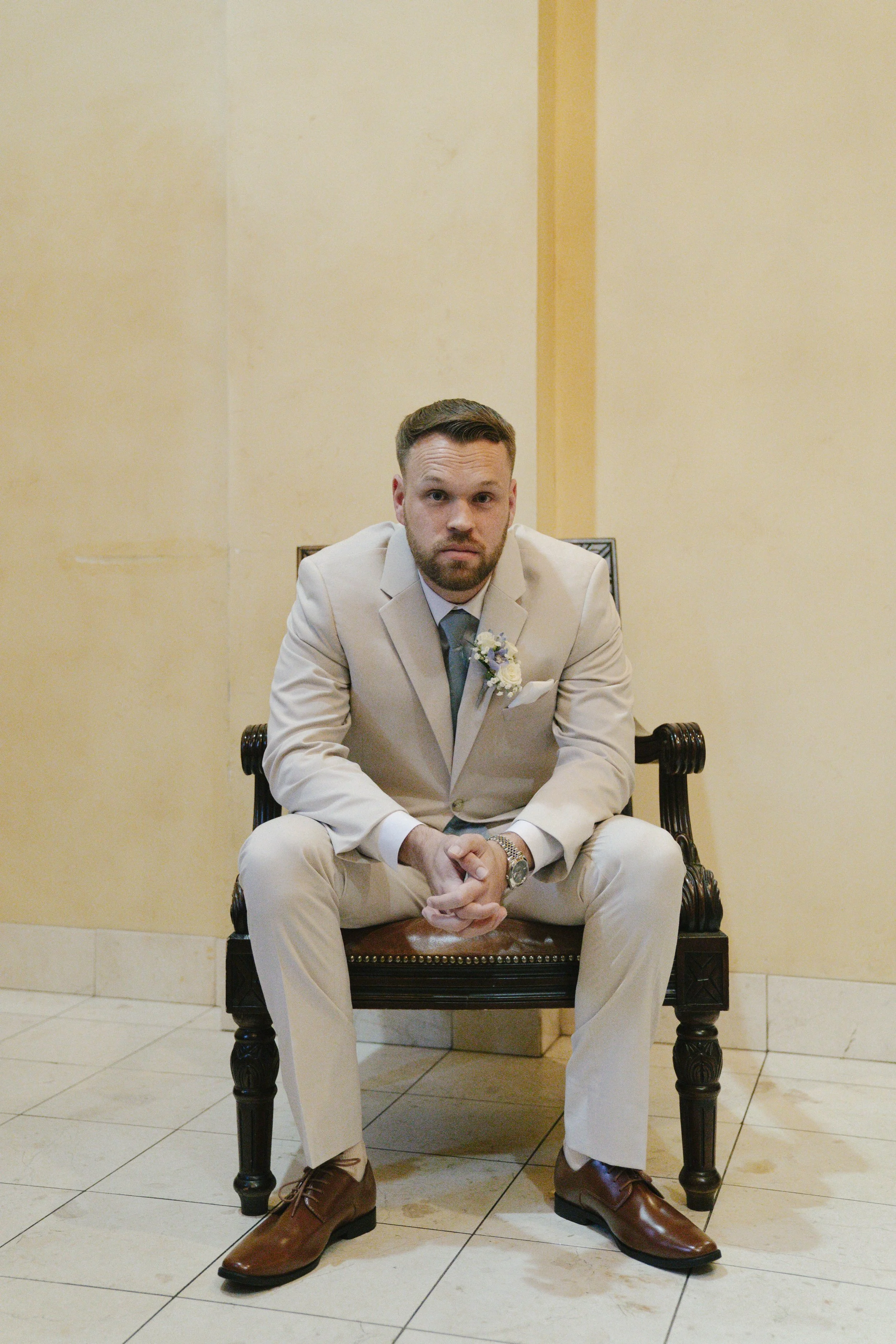 The groom’s getting-ready moments at Ashley Castle in Chandler, Arizona, capture the energy and anticipation of the wedding day, documented through hybrid film and digital photography to preserve both candid emotion and timeless detail inside this el