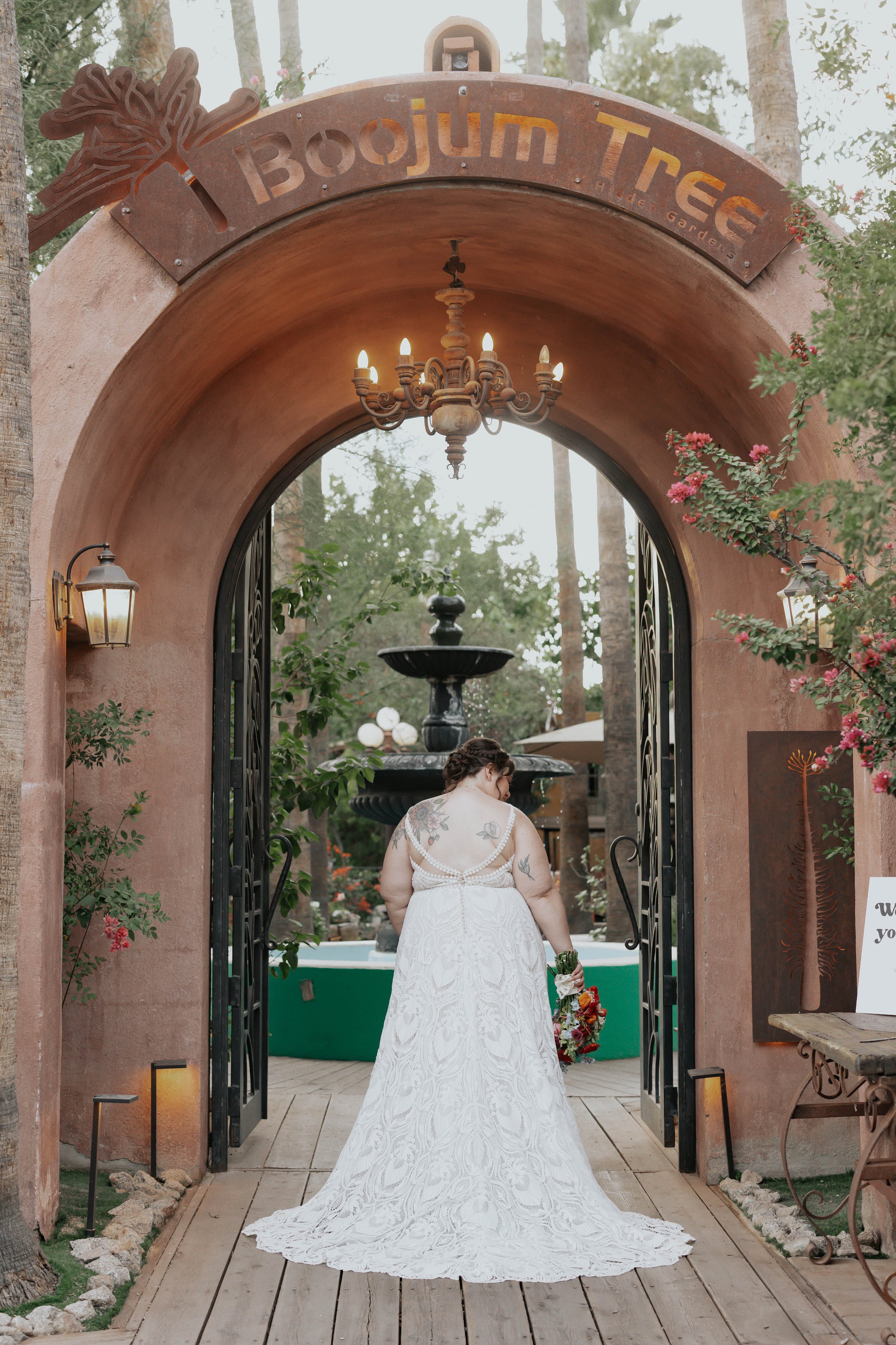 After the ceremony, Lauren and Joel explored the beautiful garden paths and adobe architecture of the Boojum Tree for their wedding portraits. Surrounded by desert greenery and warm Phoenix light, these moments captured the joy and excitement of thei