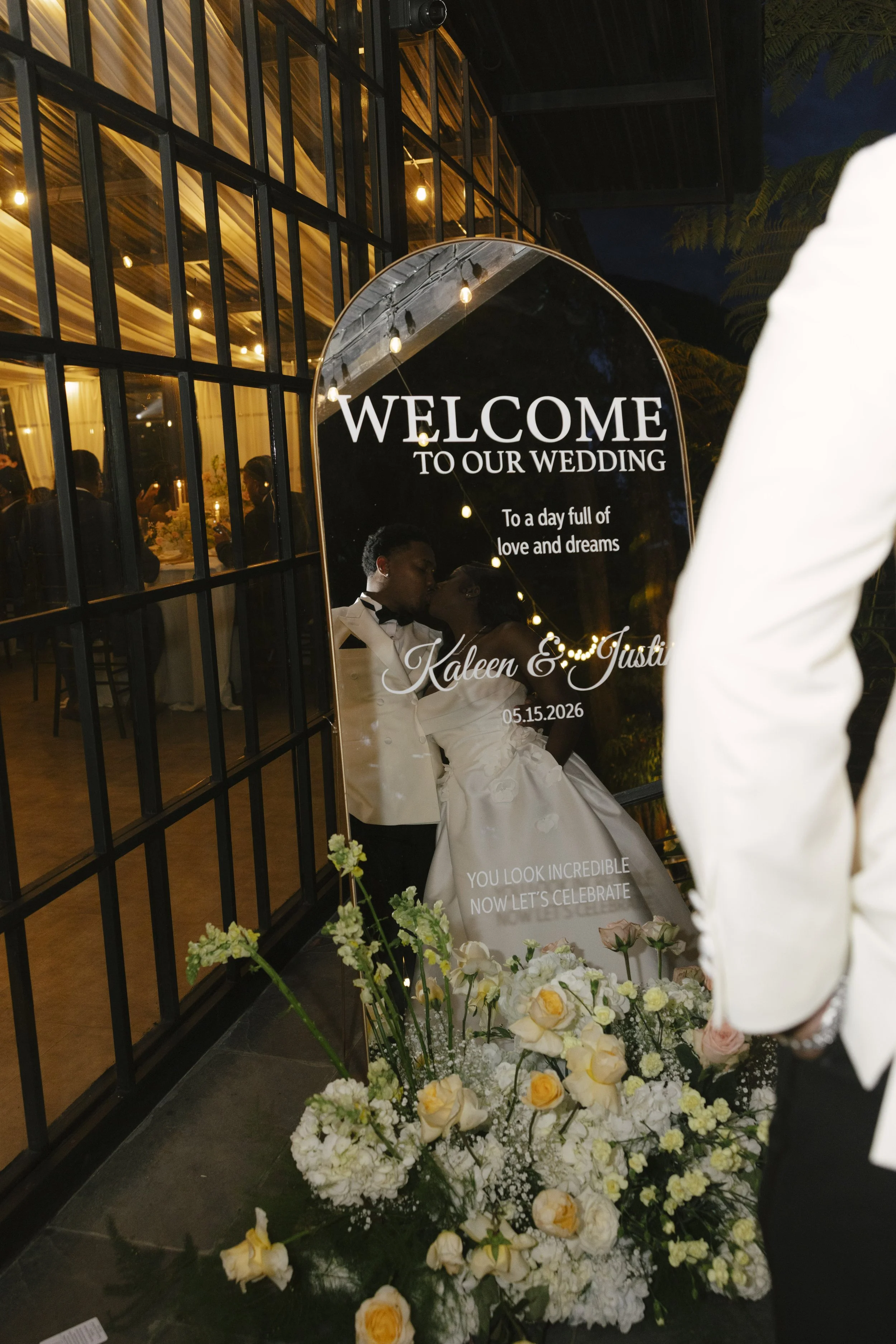 Wedding reception details at Forest Campestre in Medellín, Colombia featuring elegant reception décor, floral tablescapes, wedding cake, custom signage, first dance, and lively celebration captured through documentary wedding photography