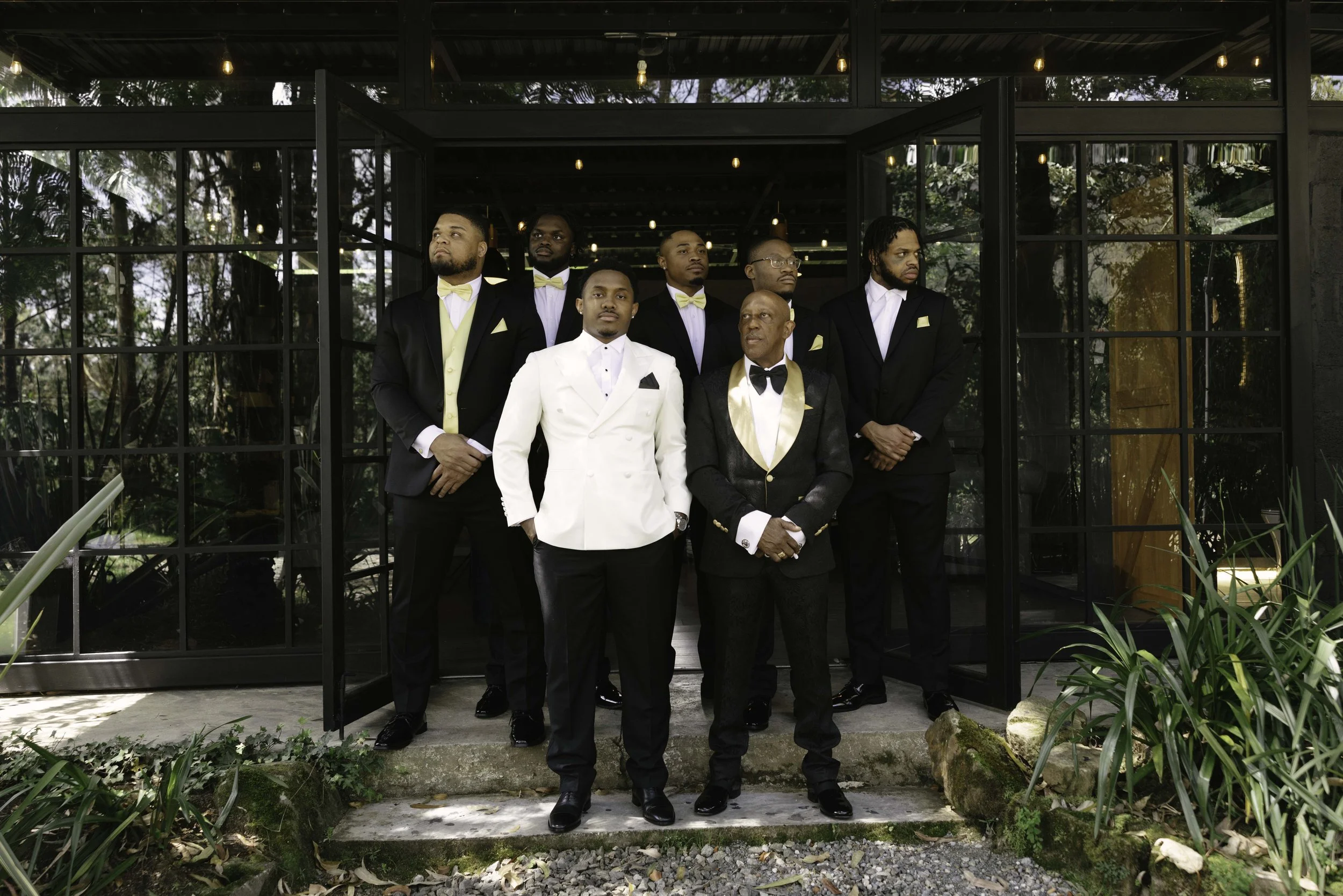 Destination wedding groom portraits at Forest Campestre in Medellín, Colombia featuring modern wedding attire, groomsmen portraits, formal wedding party photos, and documentary wedding photography