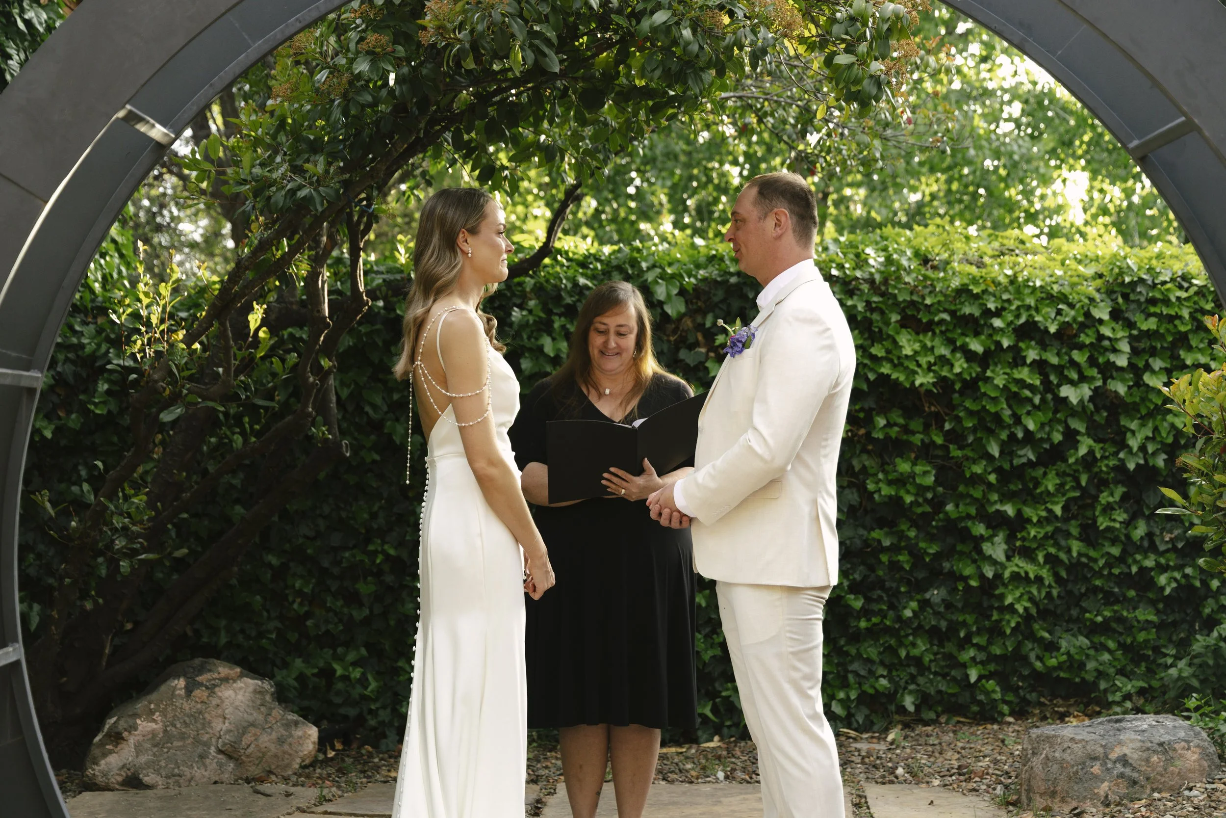 Chelsea and Travis exchanged heartfelt vows during their intimate Sedona elopement at a private Arizona home, surrounded by their closest family, friends, and beloved dog. Their outdoor ceremony was filled with meaningful moments, personal vows, and 