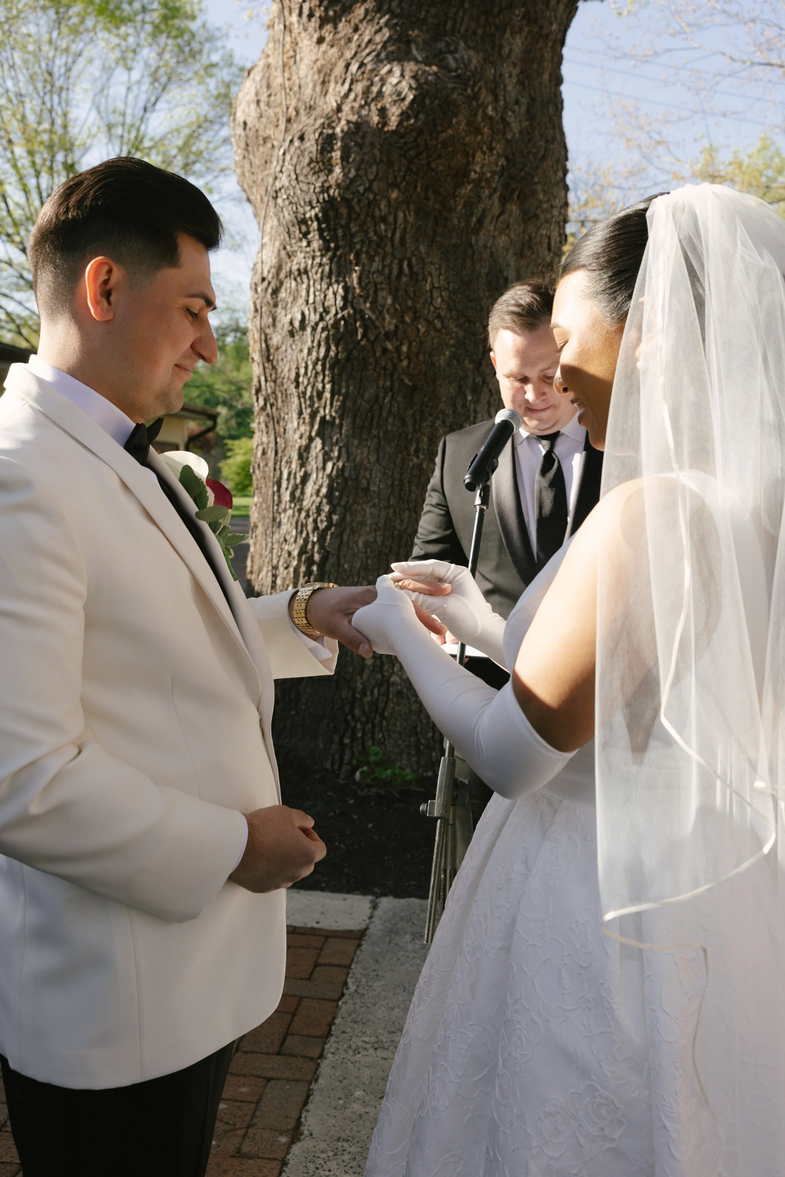Outdoor wedding ceremony at Hotel DuVillage featuring the bride and groom, wedding party, and meaningful moments captured on both digital and 35mm film. A timeless celebration documented with a candid, documentary approach
