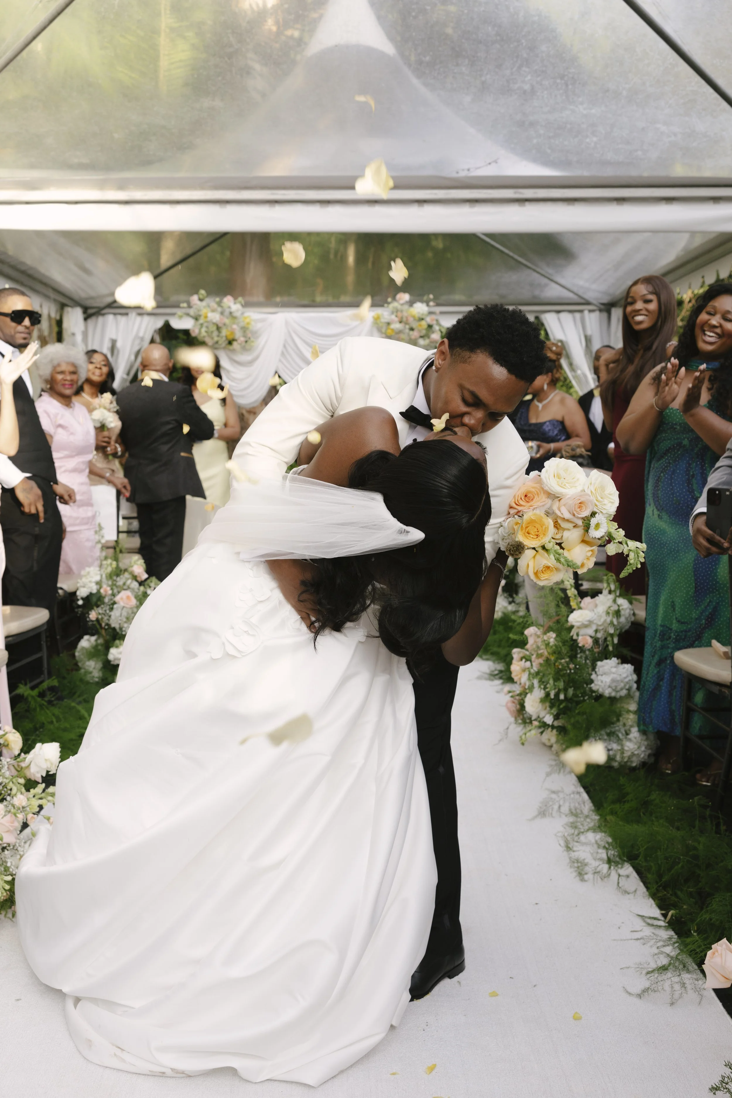 Forest Campestre wedding ceremony in Medellín, Colombia featuring the bridal processional, groom's reaction, emotional ceremony moments, floral aisle design, wedding guests, and documentary-style wedding photography