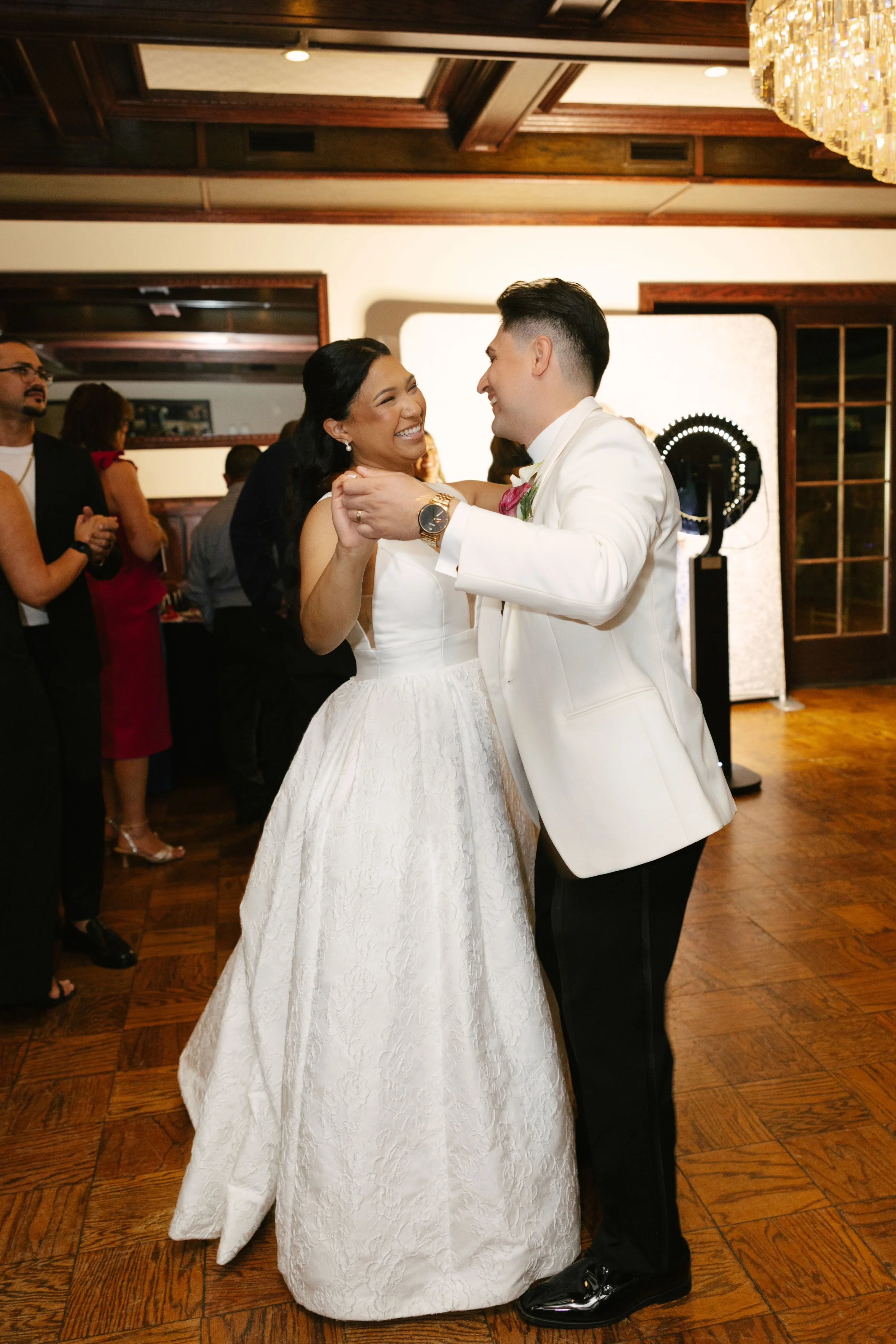 The bride and groom celebrated another unforgettable milestone by cutting their wedding cake together at Hotel DuVillage. Captured on both digital and 35mm film, these sweet moments were filled with laughter, celebration, and the joy of sharing one o