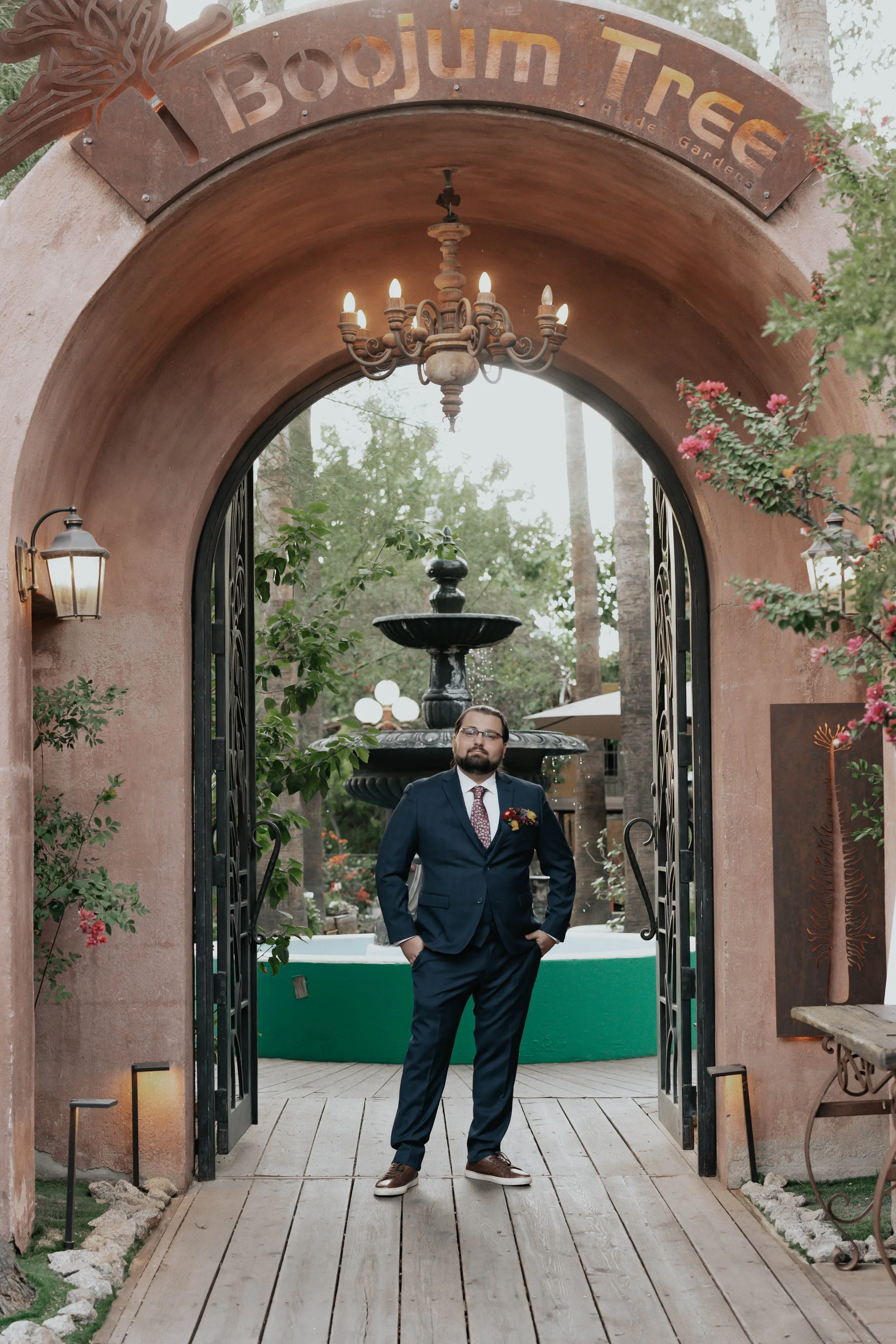 After the ceremony, Lauren and Joel explored the beautiful garden paths and adobe architecture of the Boojum Tree for their wedding portraits. Surrounded by desert greenery and warm Phoenix light, these moments captured the joy and excitement of thei