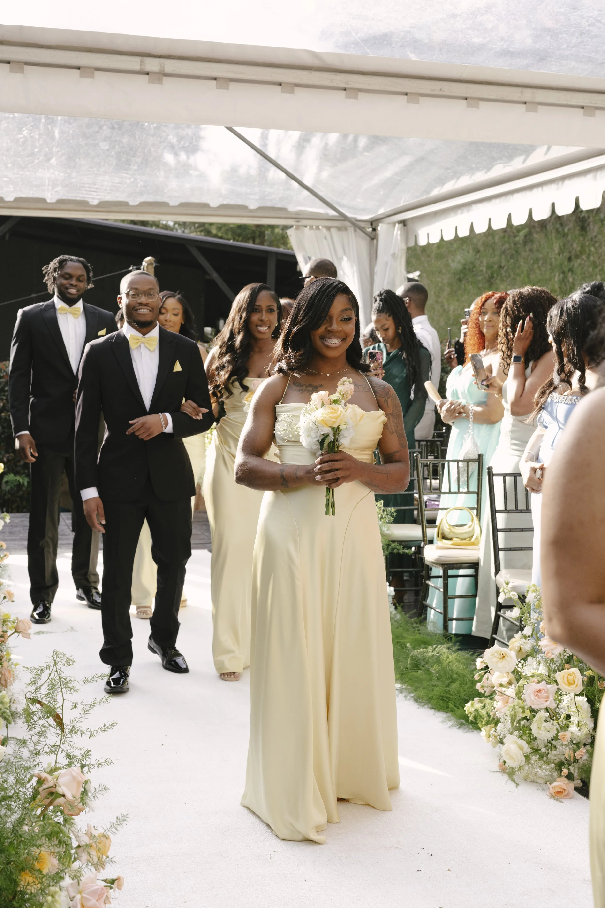 Forest Campestre wedding ceremony in Medellín, Colombia featuring the bridal processional, groom's reaction, emotional ceremony moments, floral aisle design, wedding guests, and documentary-style wedding photography
