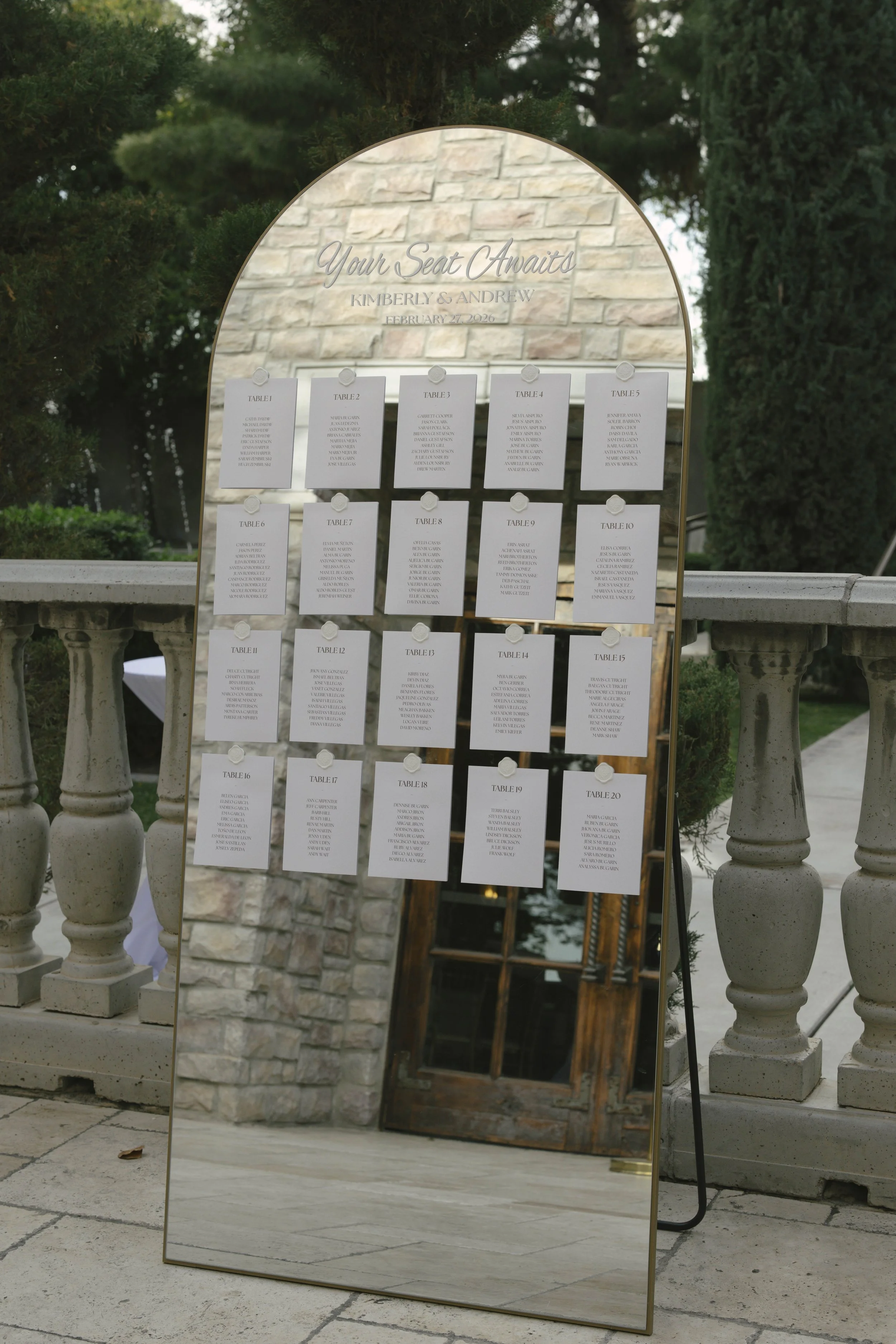 Ceremony details at Ashley Castle in Chandler, Arizona, were thoughtfully captured through hybrid film and digital photography, highlighting elegant signage, romantic seating displays, and the bridesmaid processional as guests gathered for this timel