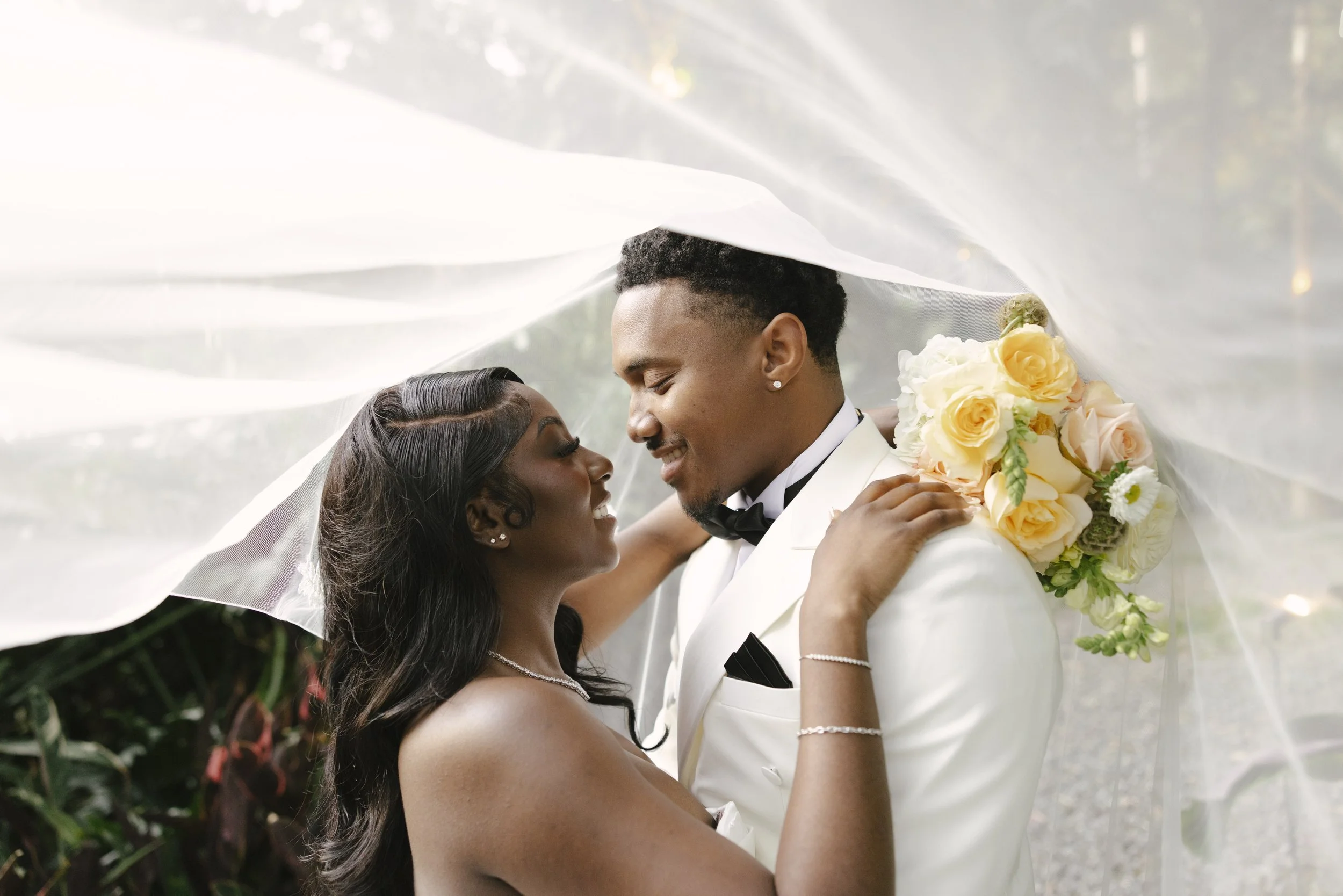 Bride and groom portraits at Forest Campestre in Medellín, Colombia featuring romantic destination wedding photography, lush tropical gardens, bridal party portraits, and natural, documentary-style moments.