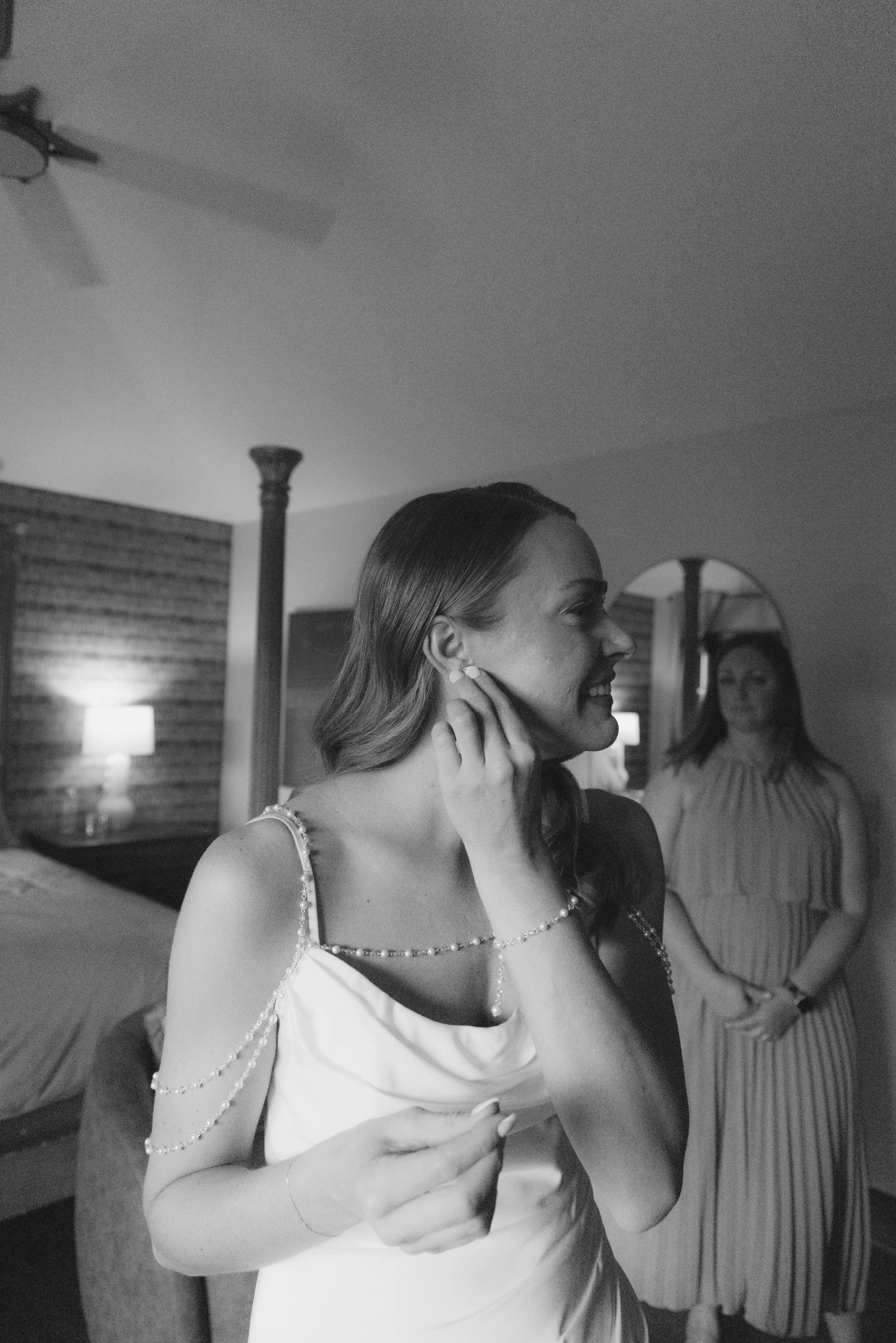 Chelsea and Travis' intimate Sedona elopement continued with heartfelt bridal getting-ready moments as the bride shared meaningful time with her mother and closest loved ones. From fastening her wedding dress and adding the finishing touches to quiet