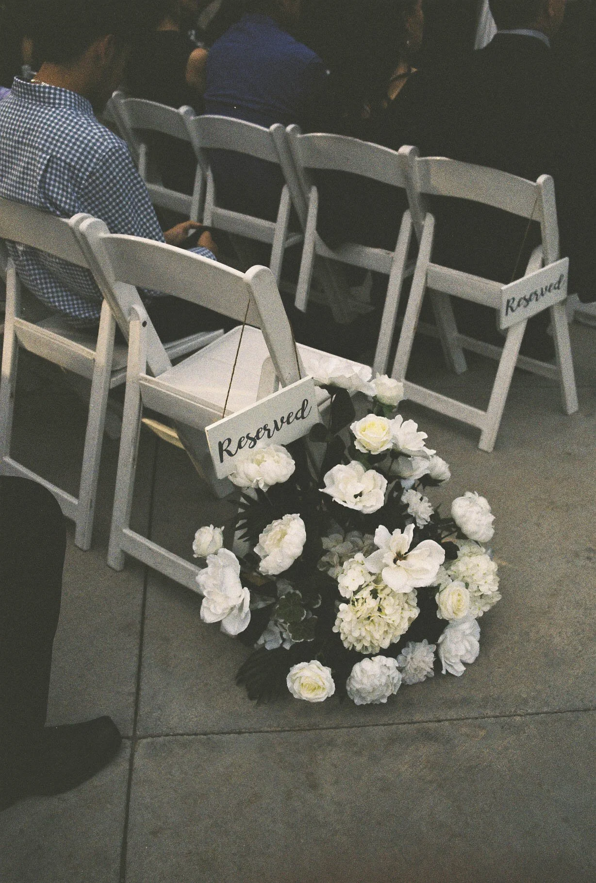 Elegant wedding details from the bride and groom’s Ashley Castle wedding in Chandler, Arizona, featuring romantic ceremony décor, personalized memorial touches, and timeless reception styling at one of Arizona’s premier luxury wedding venues.