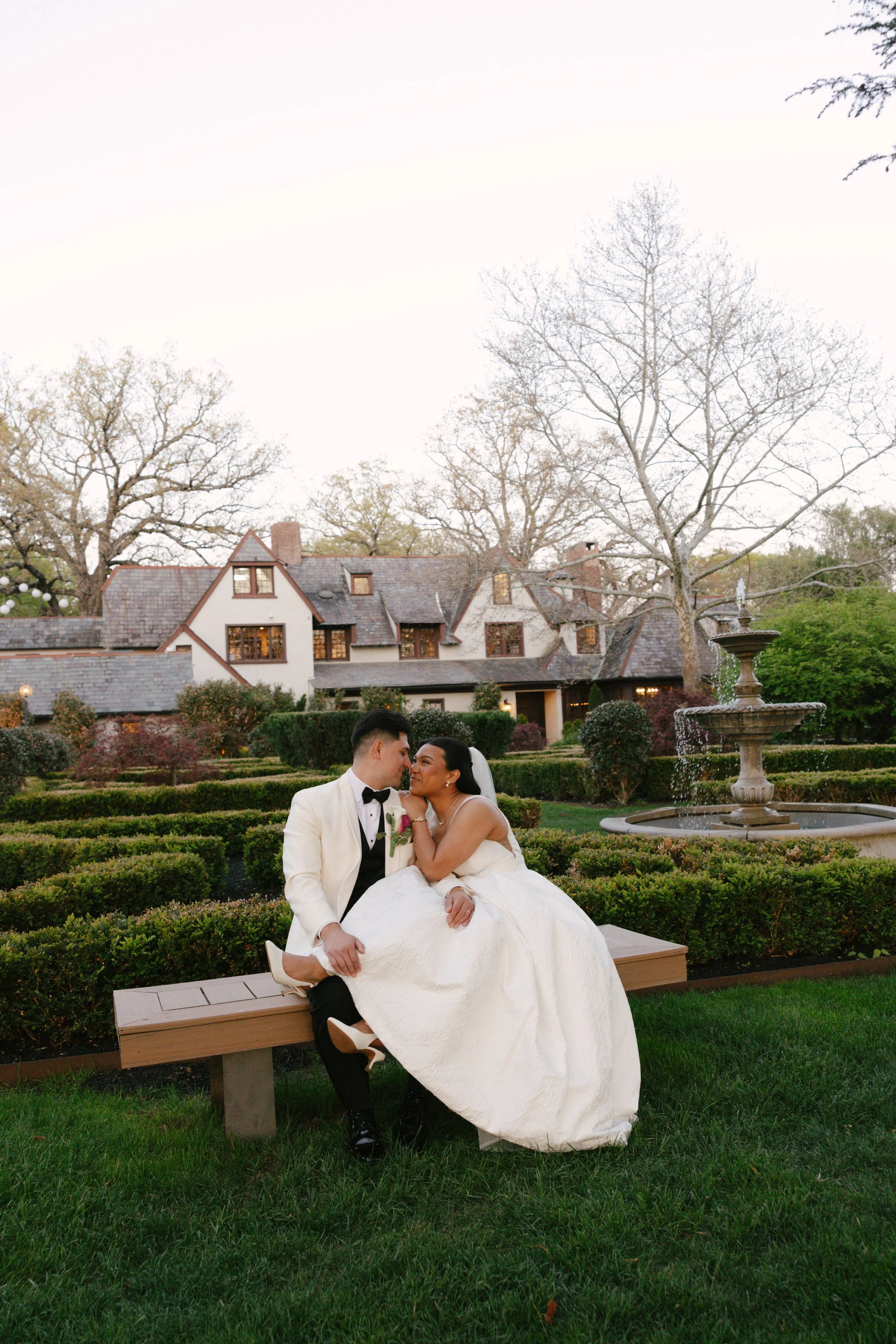 As the sun began to set, the bride and groom stepped away for golden hour portraits around the grounds of Hotel DuVillage. Captured on both digital and 35mm film, these sunset portraits highlight the warmth, romance, and quiet moments shared between 