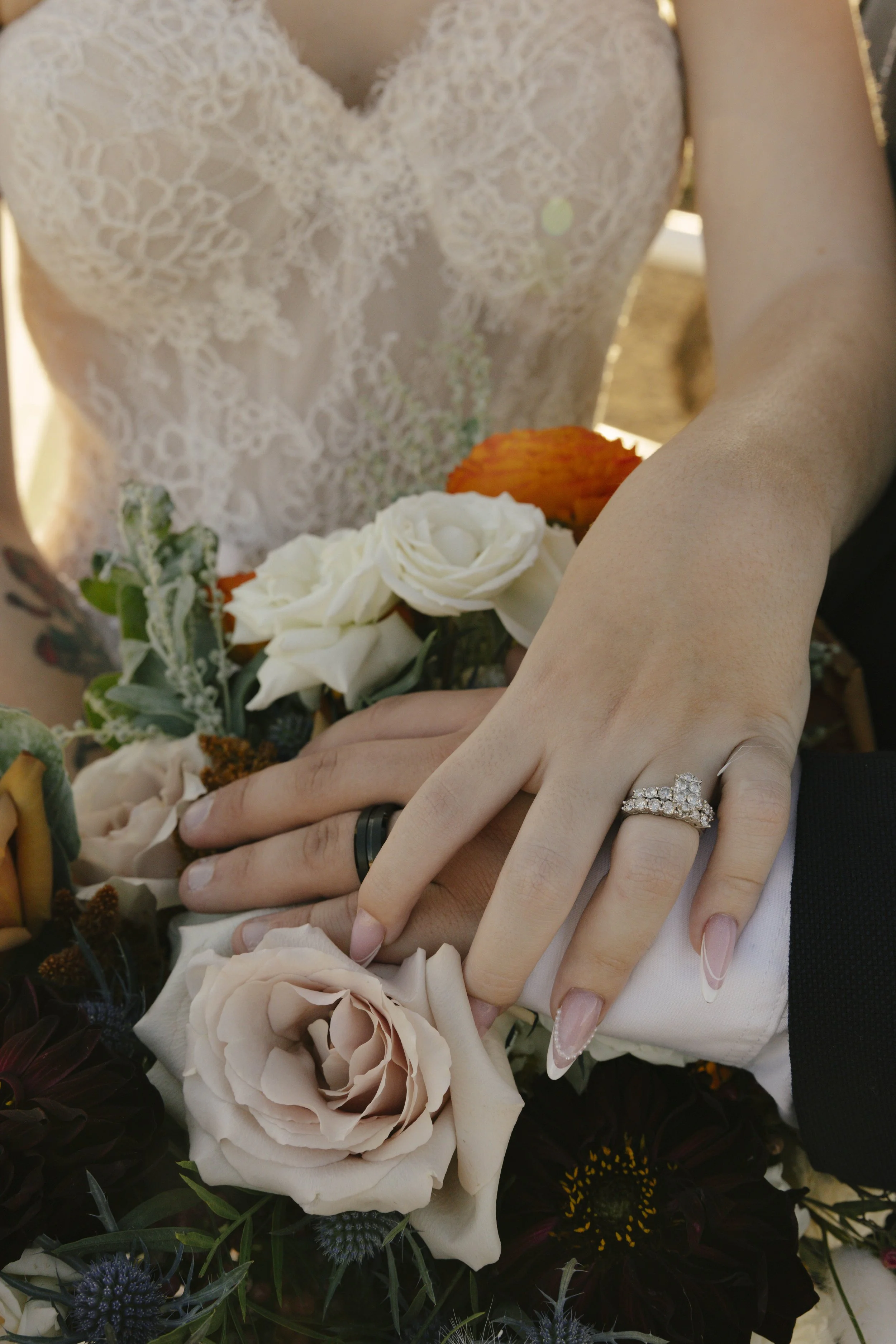 Documentary wedding photography at The Knotty Barn in Queen Creek, Arizona, captured by Arizona wedding photographer Raw By Laura, showcasing authentic moments, desert scenery, and a rustic western wedding setting.