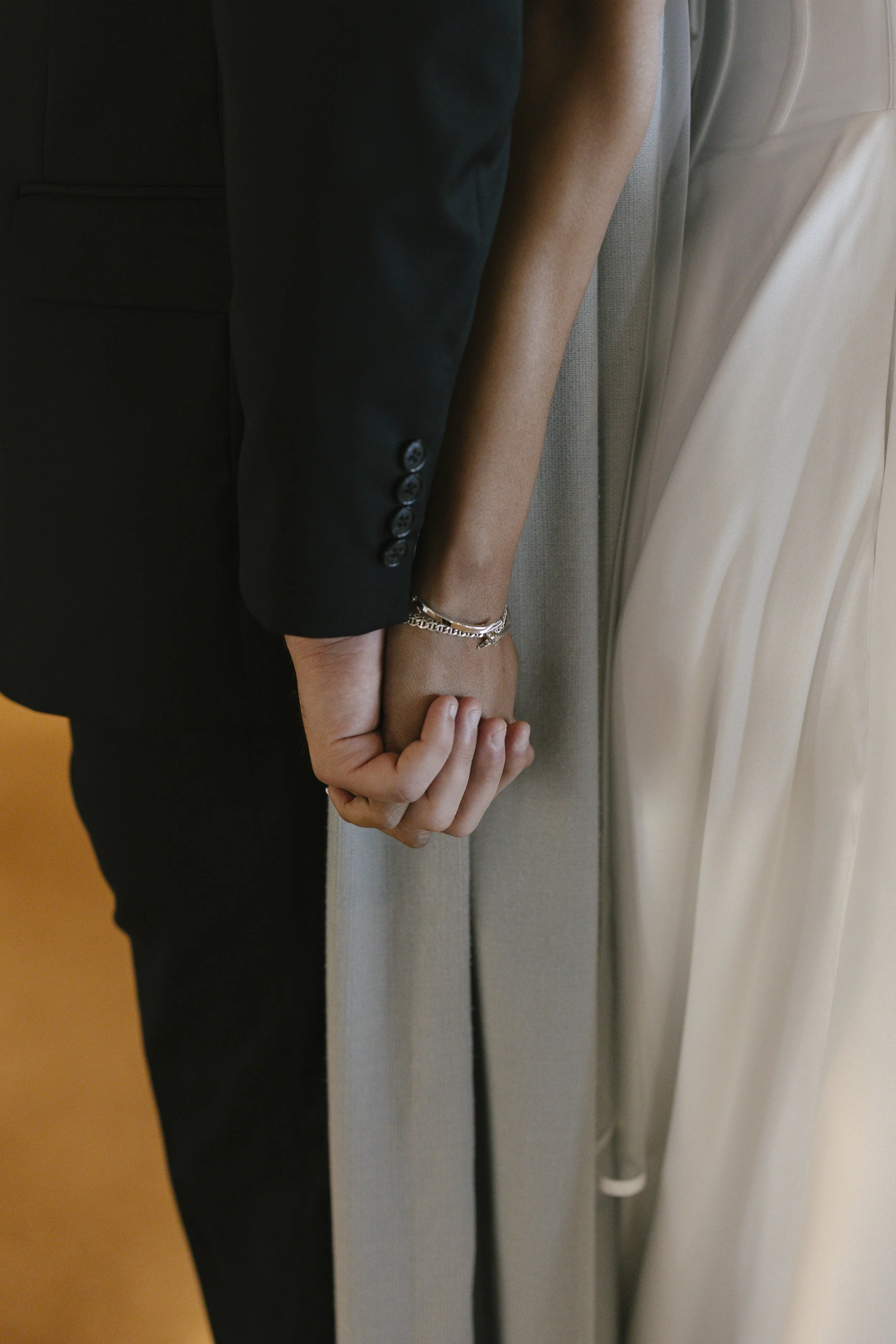 Candid wedding photography from a November celebration at The Clayton House in Scottsdale, Arizona, photographed by Raw By Laura, showcasing real emotion, contemporary architecture, and meaningful moments.