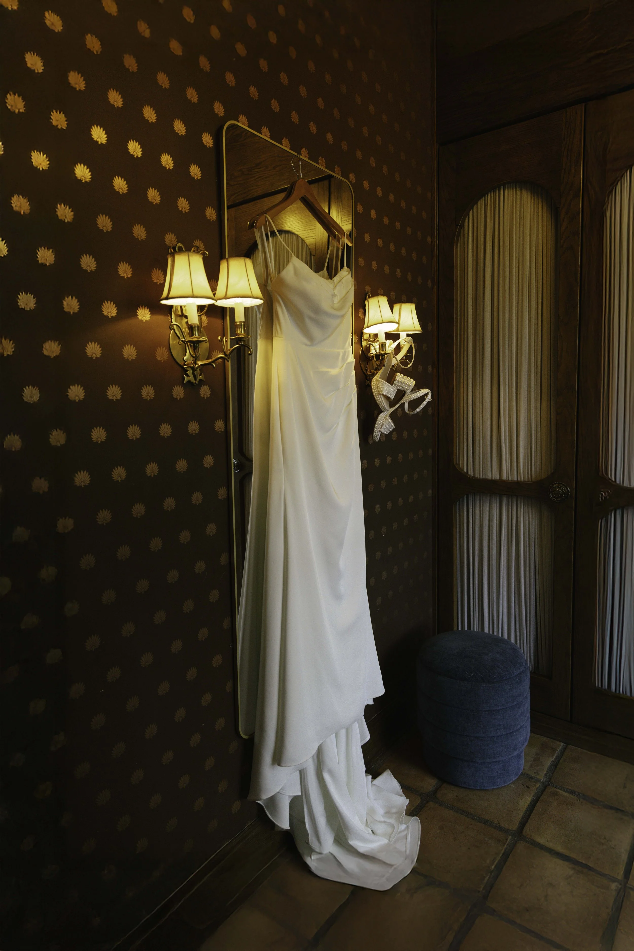 Elegant bridal details from Chelsea and Travis' intimate Sedona elopement, featuring the bride's wedding dress, shoes, rings, jewelry, and vibrant bouquet before getting ready for their private Arizona ceremony. Every carefully chosen detail reflecte