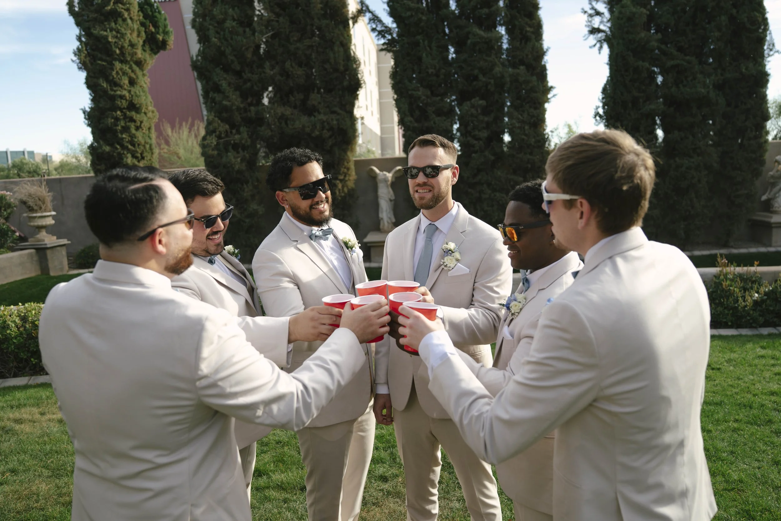 The bridal party portraits at Ashley Castle in Chandler, Arizona, brought playful energy and celebration to the day, with hybrid film and digital photography capturing candid laughter, stylish group moments, and unforgettable memories with the bride,