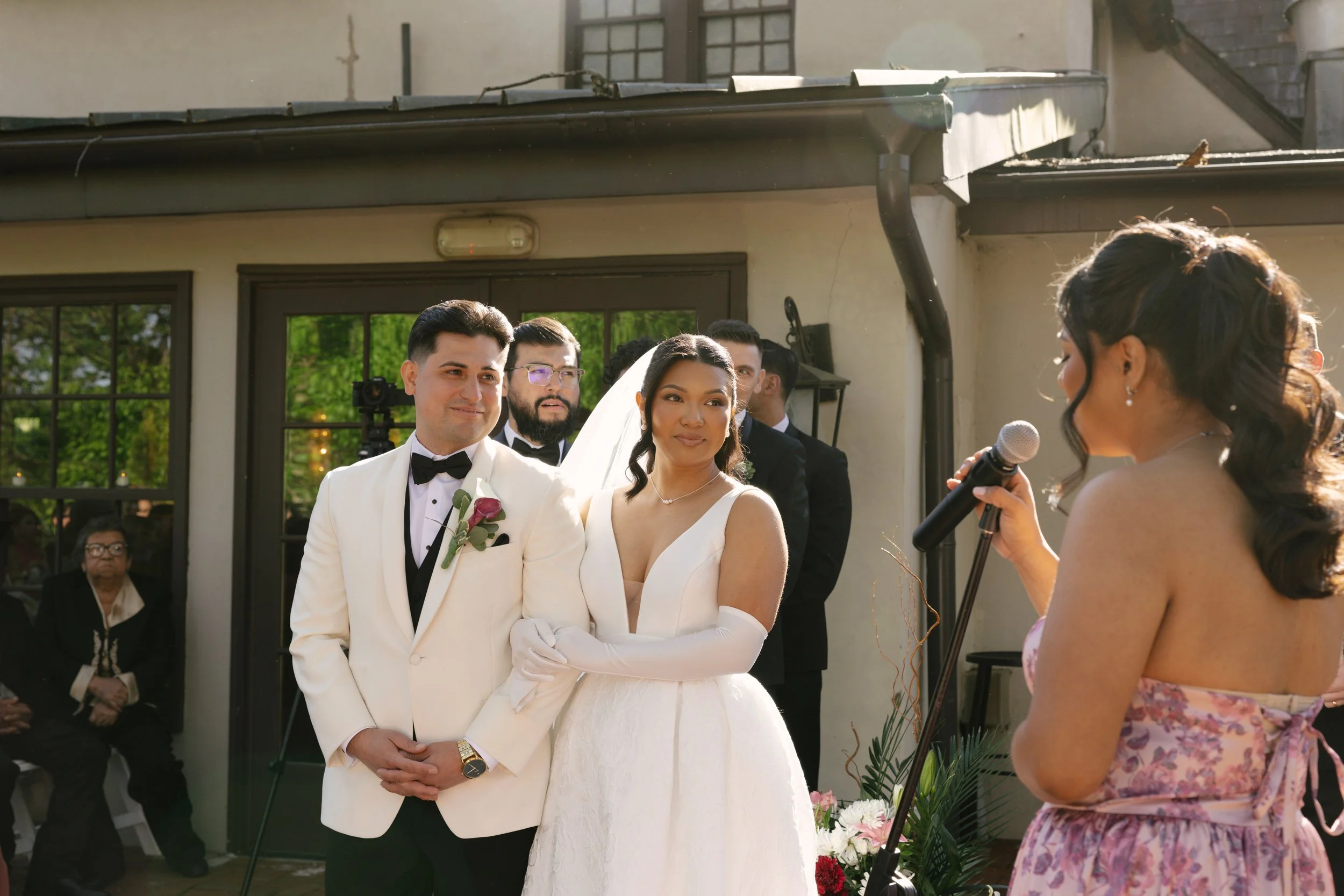 Outdoor wedding ceremony at Hotel DuVillage featuring the bride and groom, wedding party, and meaningful moments captured on both digital and 35mm film. A timeless celebration documented with a candid, documentary approach