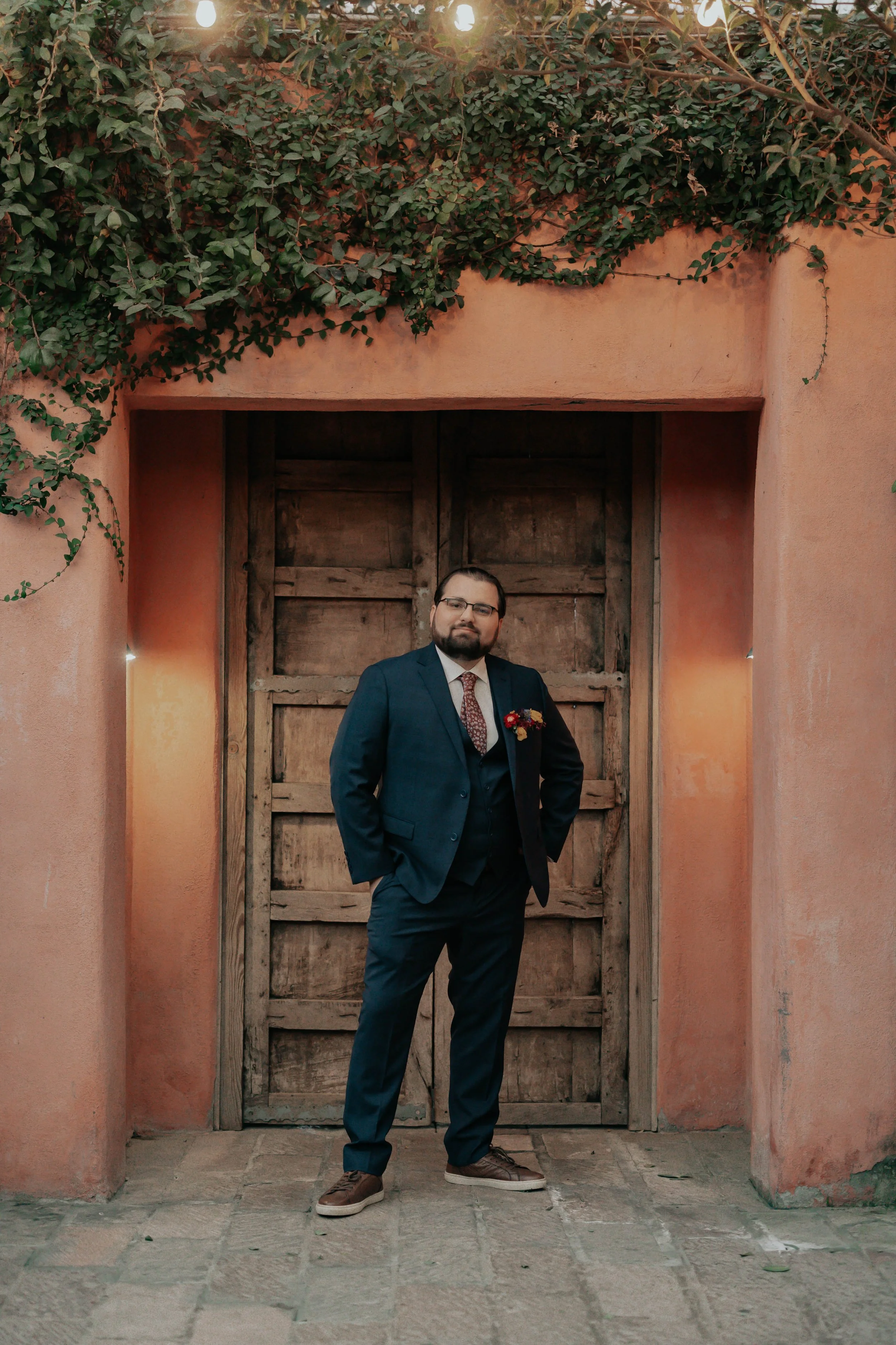 After the ceremony, Lauren and Joel explored the beautiful garden paths and adobe architecture of the Boojum Tree for their wedding portraits. Surrounded by desert greenery and warm Phoenix light, these moments captured the joy and excitement of thei