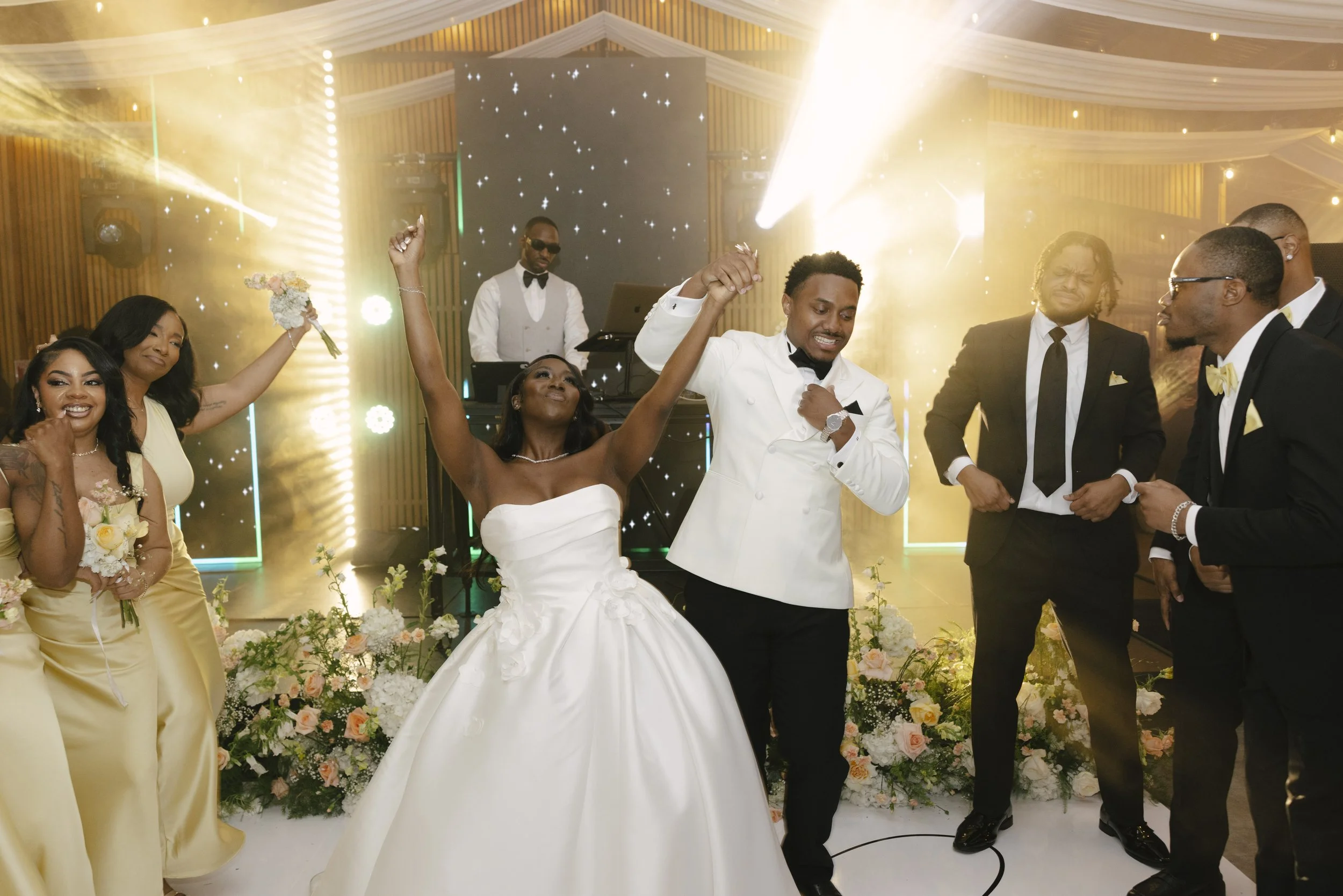 Wedding reception details at Forest Campestre in Medellín, Colombia featuring elegant reception décor, floral tablescapes, wedding cake, custom signage, first dance, and lively celebration captured through documentary wedding photography