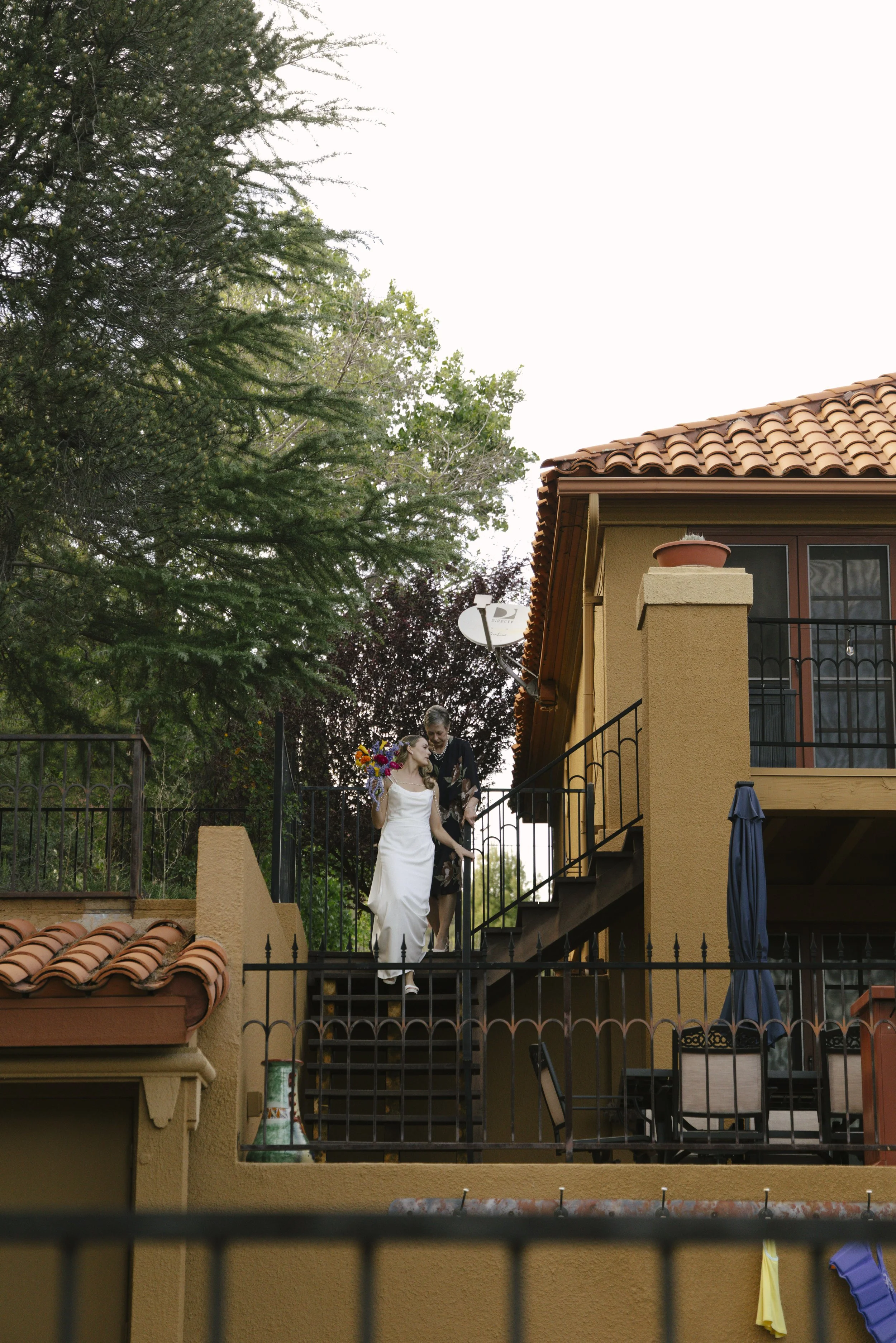 Chelsea and Travis shared an intimate first look surrounded by the natural beauty of Sedona before exchanging vows during their private Arizona elopement ceremony. Set along a peaceful garden path, these heartfelt moments marked the beginning of thei