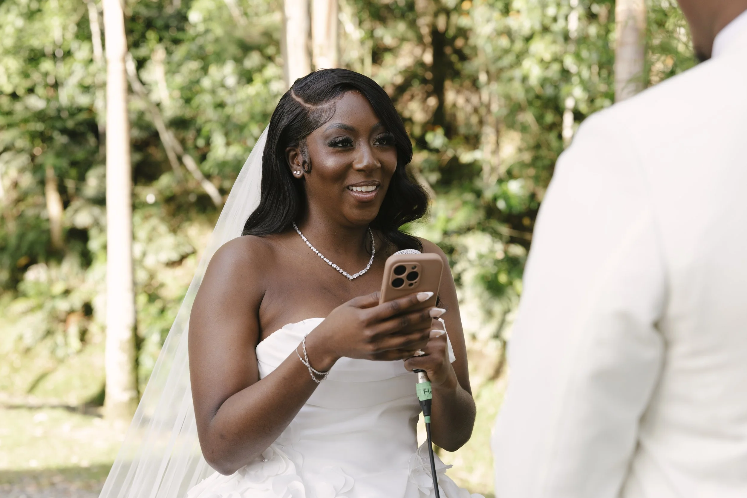Forest Campestre wedding ceremony in Medellín, Colombia featuring the bridal processional, groom's reaction, emotional ceremony moments, floral aisle design, wedding guests, and documentary-style wedding photography