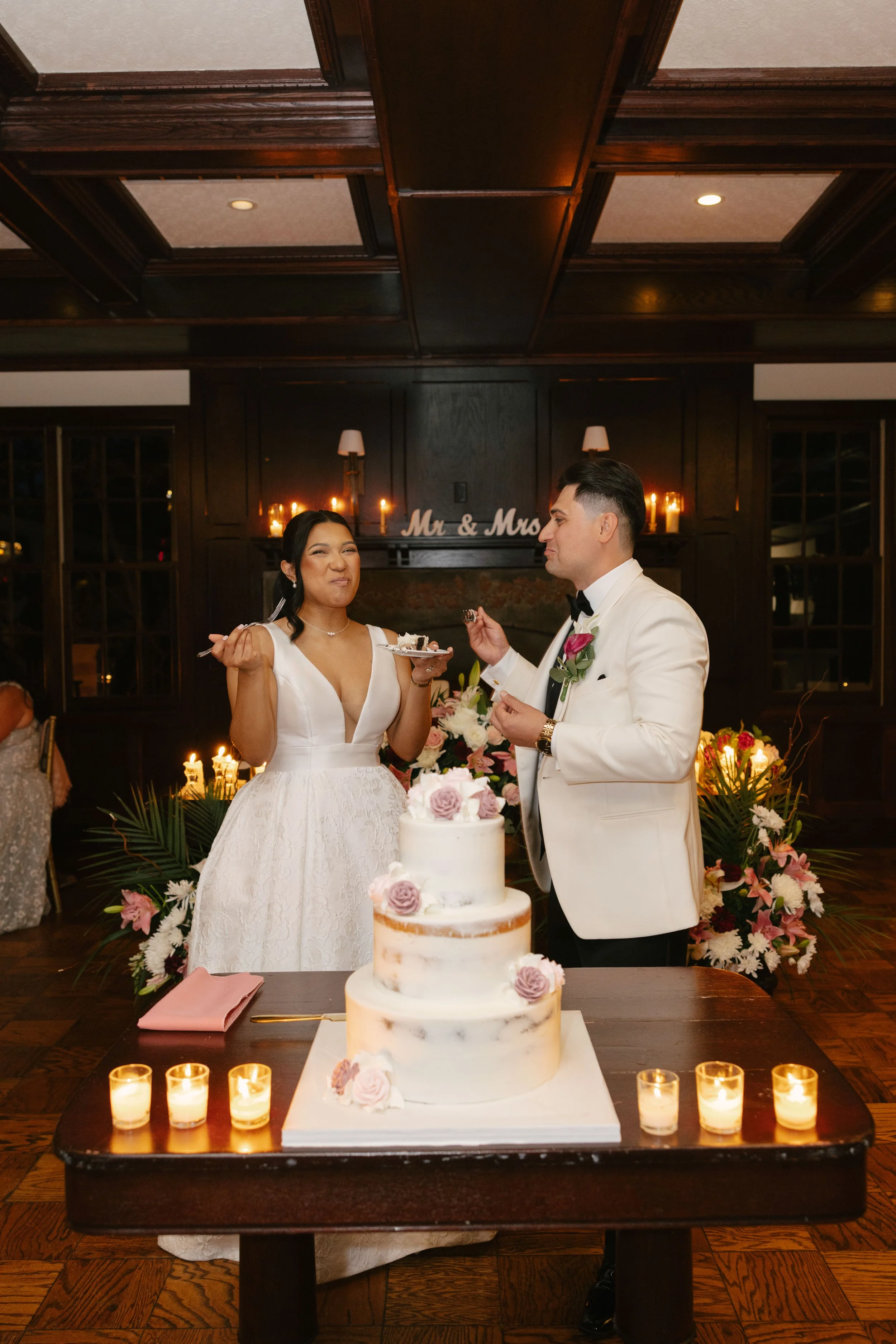 The bride and groom celebrated another unforgettable milestone by cutting their wedding cake together at Hotel DuVillage. Captured on both digital and 35mm film, these sweet moments were filled with laughter, celebration, and the joy of sharing one o