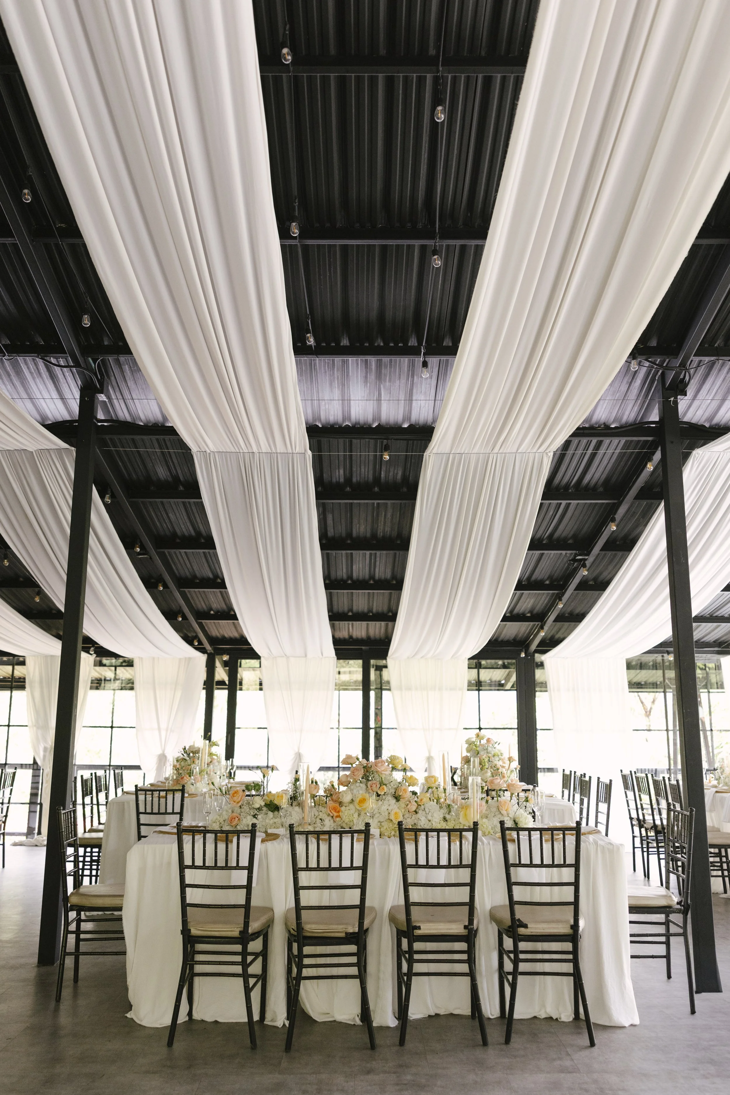 Documentary wedding photography showcasing bridal preparations, bridesmaids, wedding details, floral ceremony design, reception décor, invitation suite, wedding dress, and intimate getting ready moments at Forest Campestre in Medellín, Colombia.