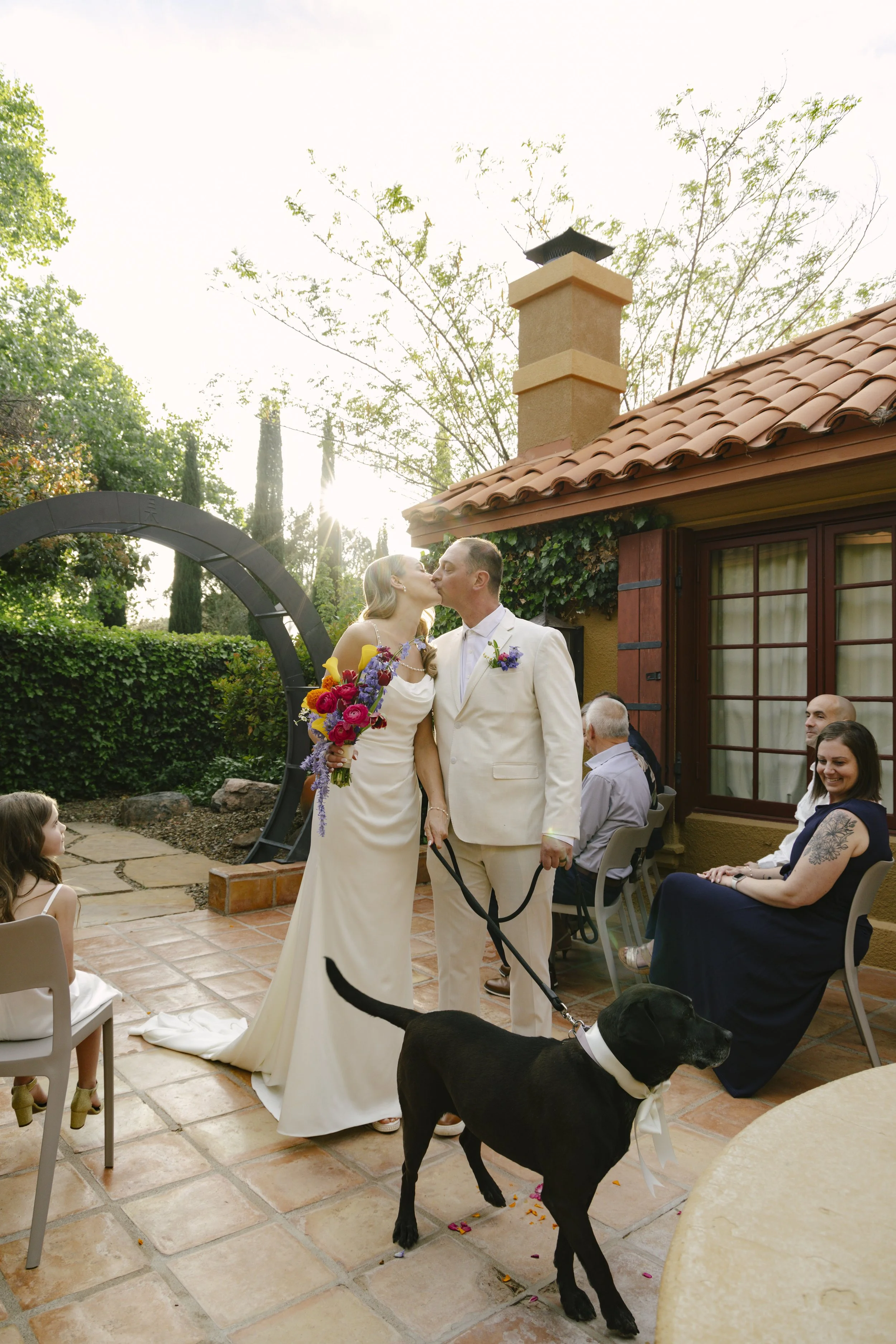 Chelsea and Travis exchanged heartfelt vows during their intimate Sedona elopement at a private Arizona home, surrounded by their closest family, friends, and beloved dog. Their outdoor ceremony was filled with meaningful moments, personal vows, and 