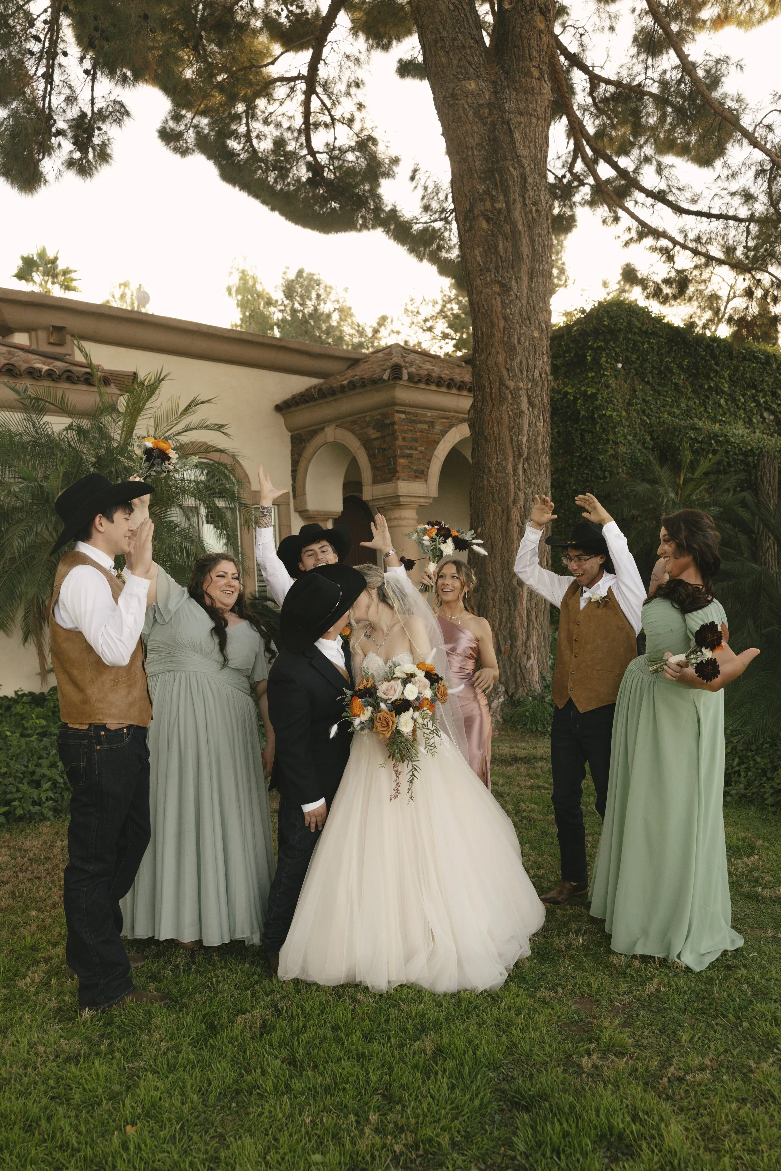 Documentary wedding photography at The Knotty Barn in Queen Creek, Arizona, captured by Arizona wedding photographer Raw By Laura, showcasing authentic moments, desert scenery, and a rustic western wedding setting.