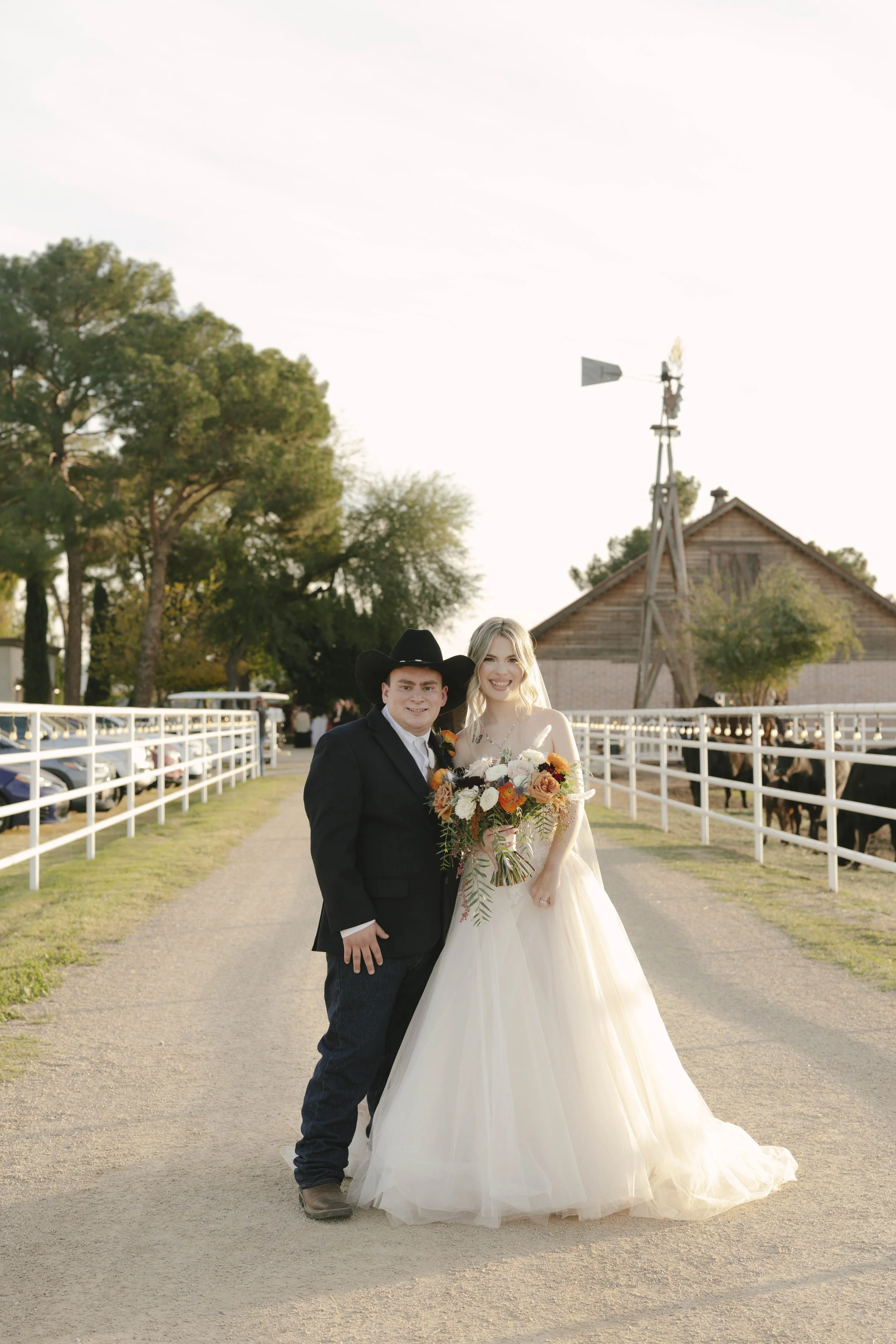 Documentary wedding photography at The Knotty Barn in Queen Creek, Arizona, captured by Arizona wedding photographer Raw By Laura, showcasing authentic moments, desert scenery, and a rustic western wedding setting.