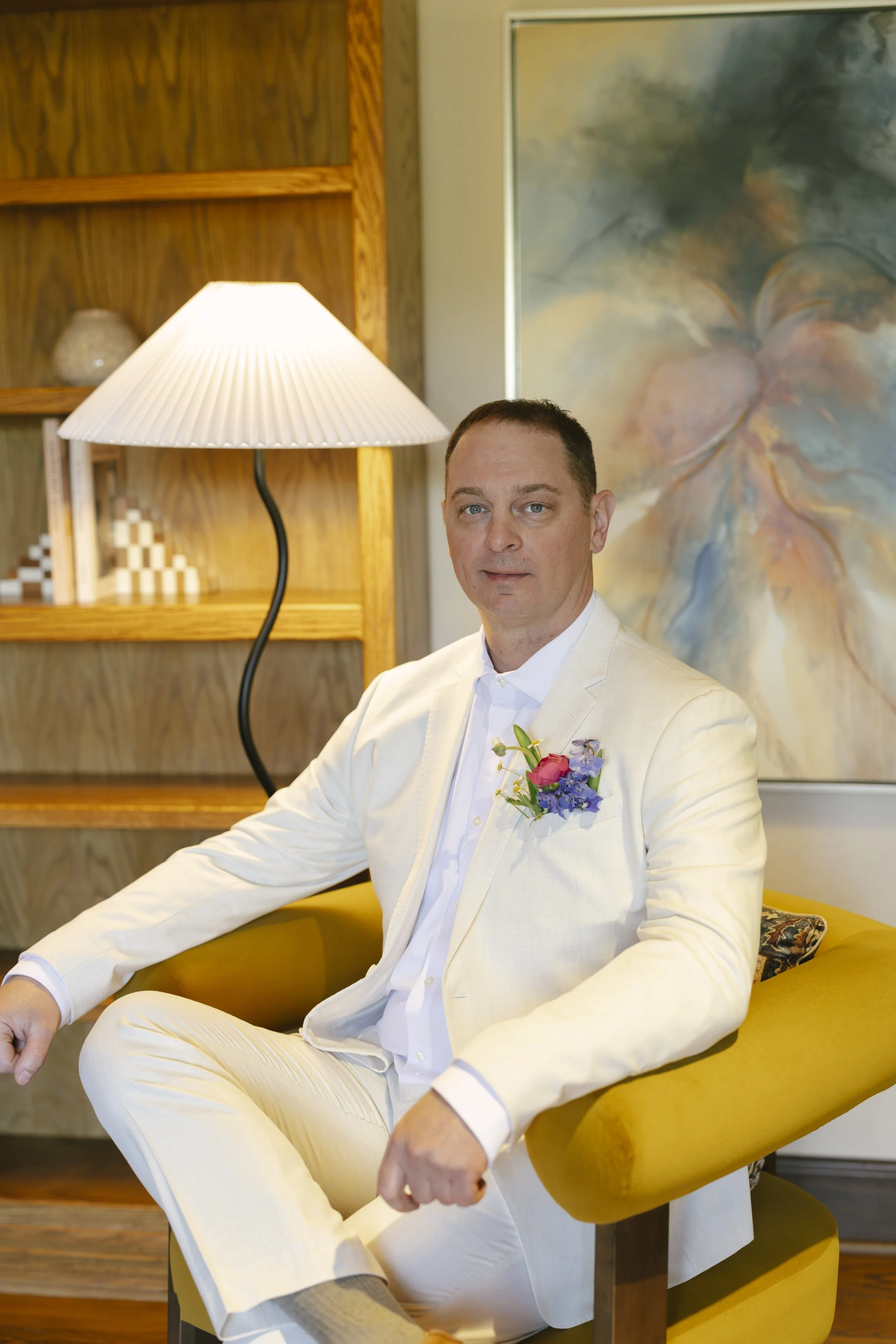 Chelsea and Travis' intimate Sedona elopement began with the groom getting ready alongside his family at a private Arizona home. From tailored wedding attire and meaningful family portraits to heartfelt moments helping him prepare, every detail refle