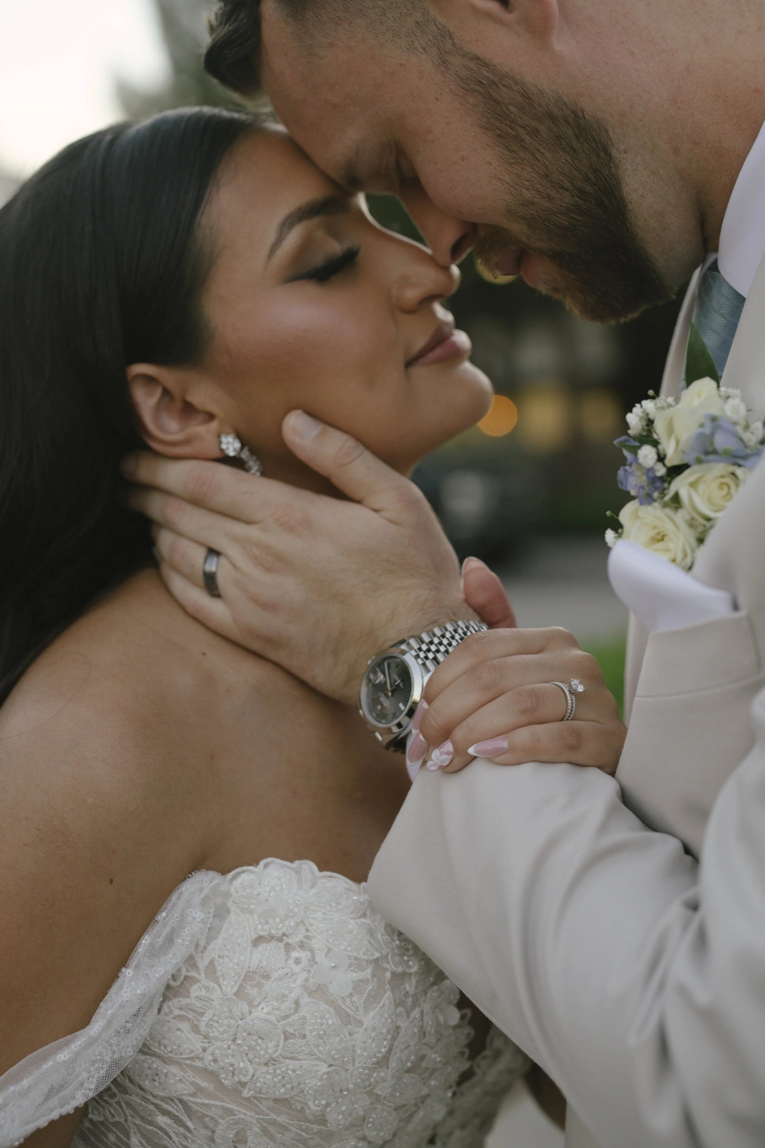 Intimate bride and groom portraits at Ashley Castle in Chandler, Arizona, were captured through hybrid film and digital photography, preserving romantic close-up moments filled with emotion, tenderness, and timeless newlywed connection.