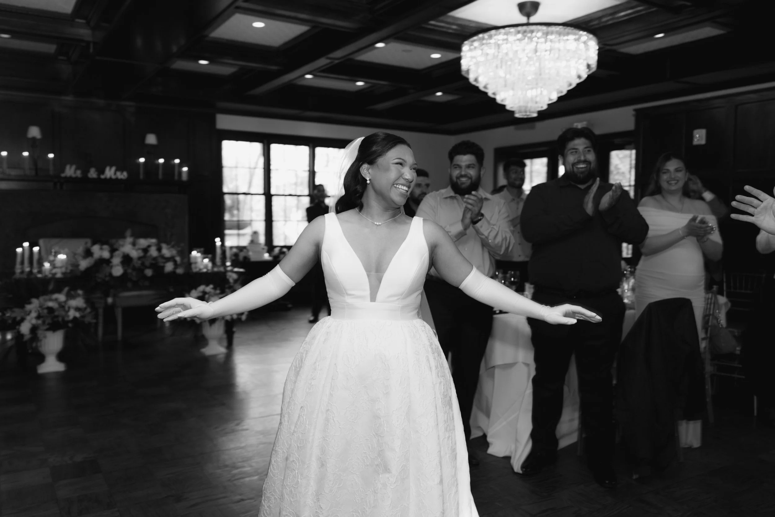 The reception at Hotel DuVillage kicked off with an unforgettable grand entrance as the bride, groom, and their loved ones filled the room with energy and excitement. From the first dance to the celebration that followed, every moment was captured on