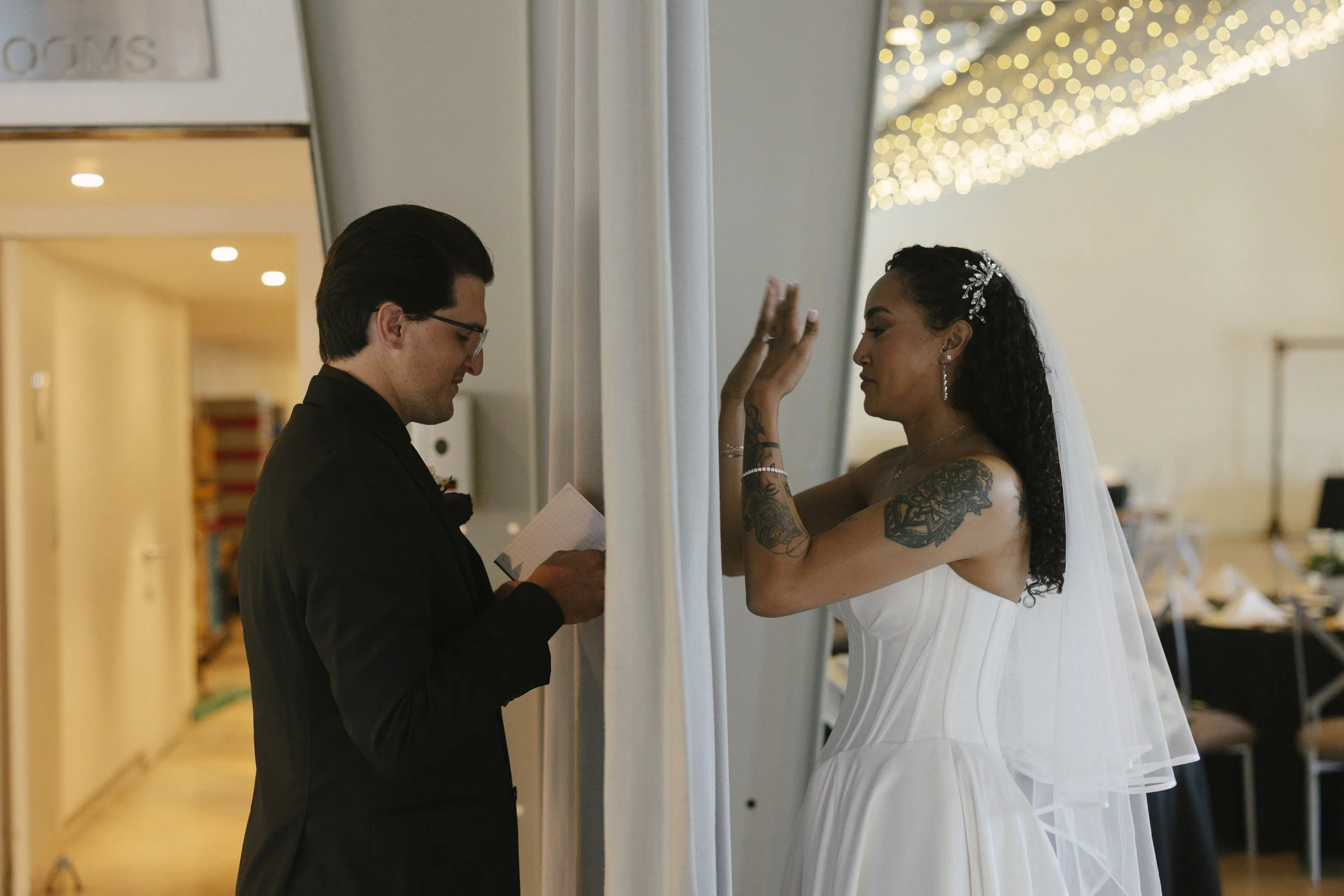 Candid wedding photography from a November celebration at The Clayton House in Scottsdale, Arizona, photographed by Raw By Laura, showcasing real emotion, contemporary architecture, and meaningful moments.