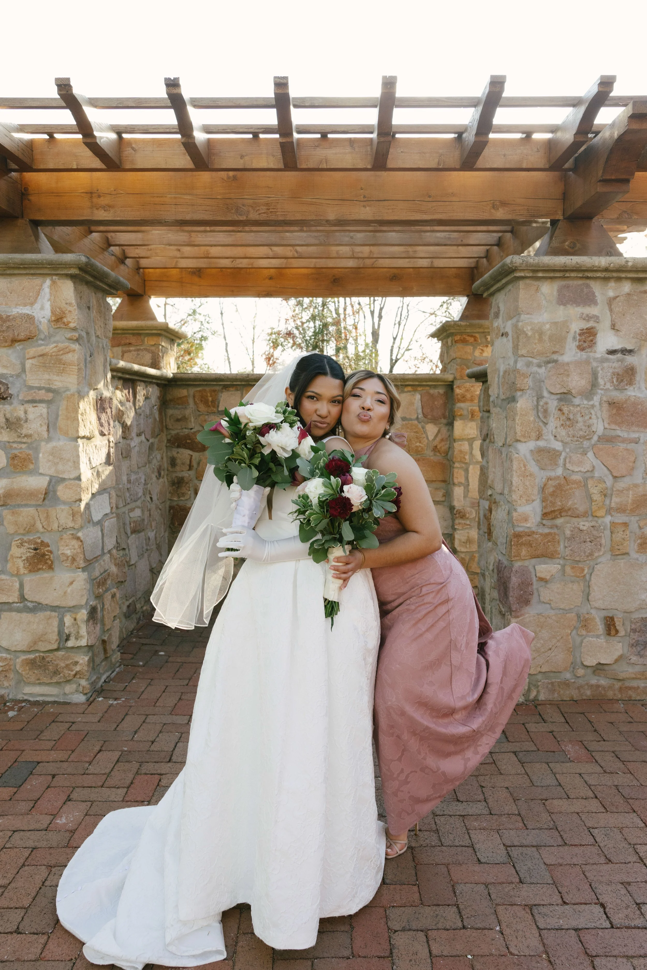 Bridal party portraits at Hotel DuVillage celebrate the bride and groom alongside their closest friends and family. Captured on digital and 35mm film, these images highlight genuine laughter, timeless portraits, and unforgettable moments.