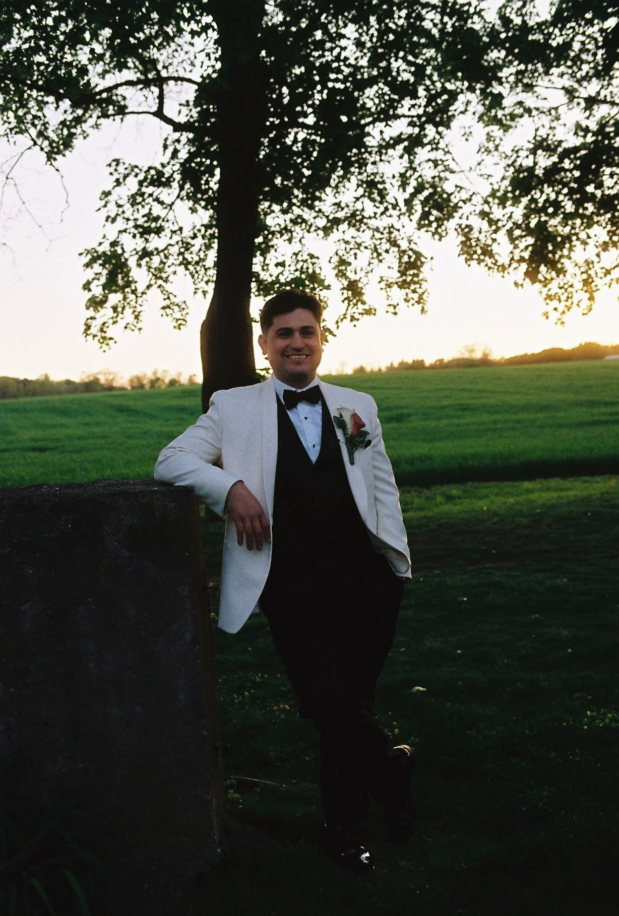 As the sun began to set, the bride and groom stepped away for golden hour portraits around the grounds of Hotel DuVillage. Captured on both digital and 35mm film, these sunset portraits highlight the warmth, romance, and quiet moments shared between 