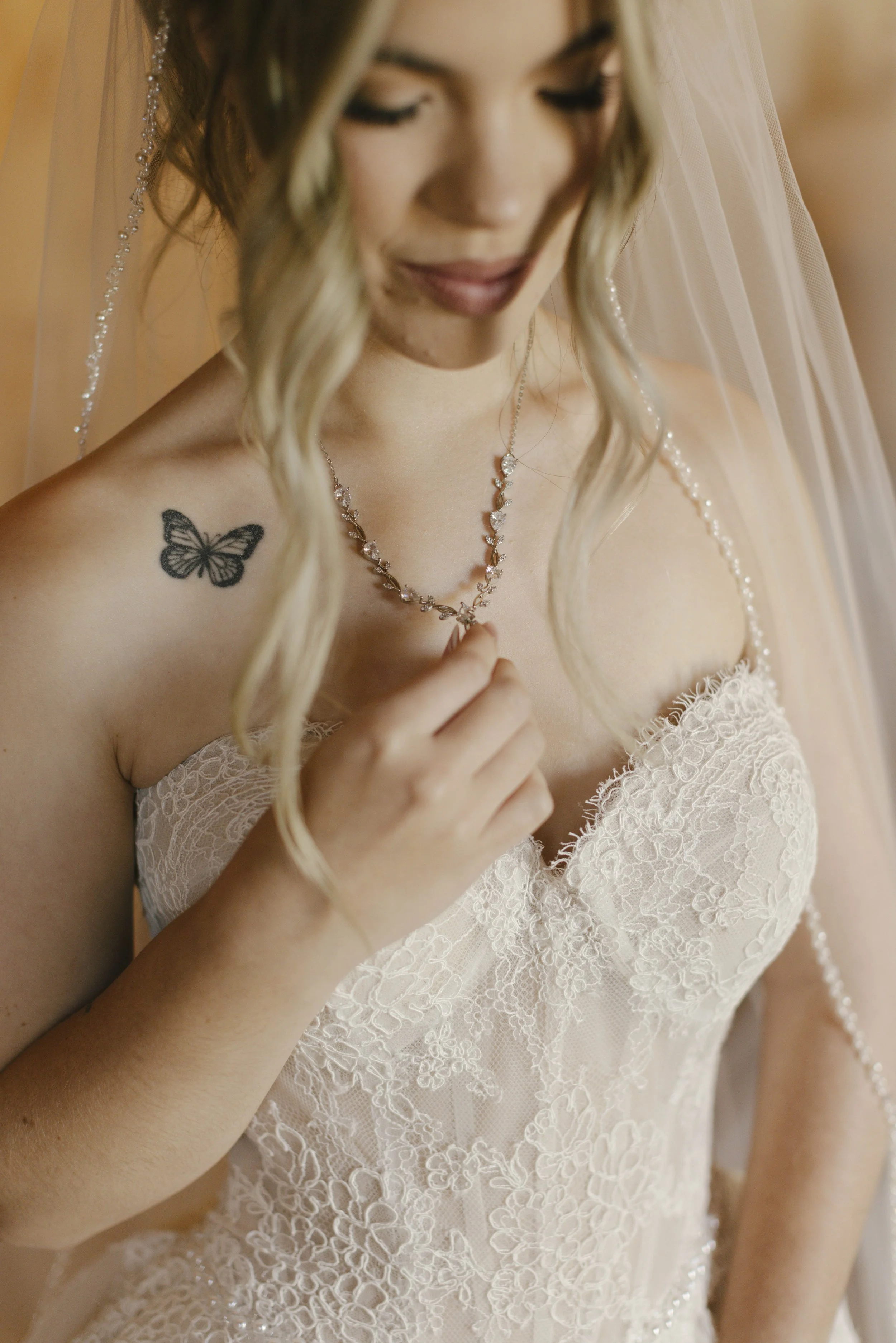 Candid wedding photography from a December wedding at The Knotty Barn in Queen Creek, Arizona, photographed by Raw By Laura, highlighting natural emotion, rustic details, and warm desert tones.