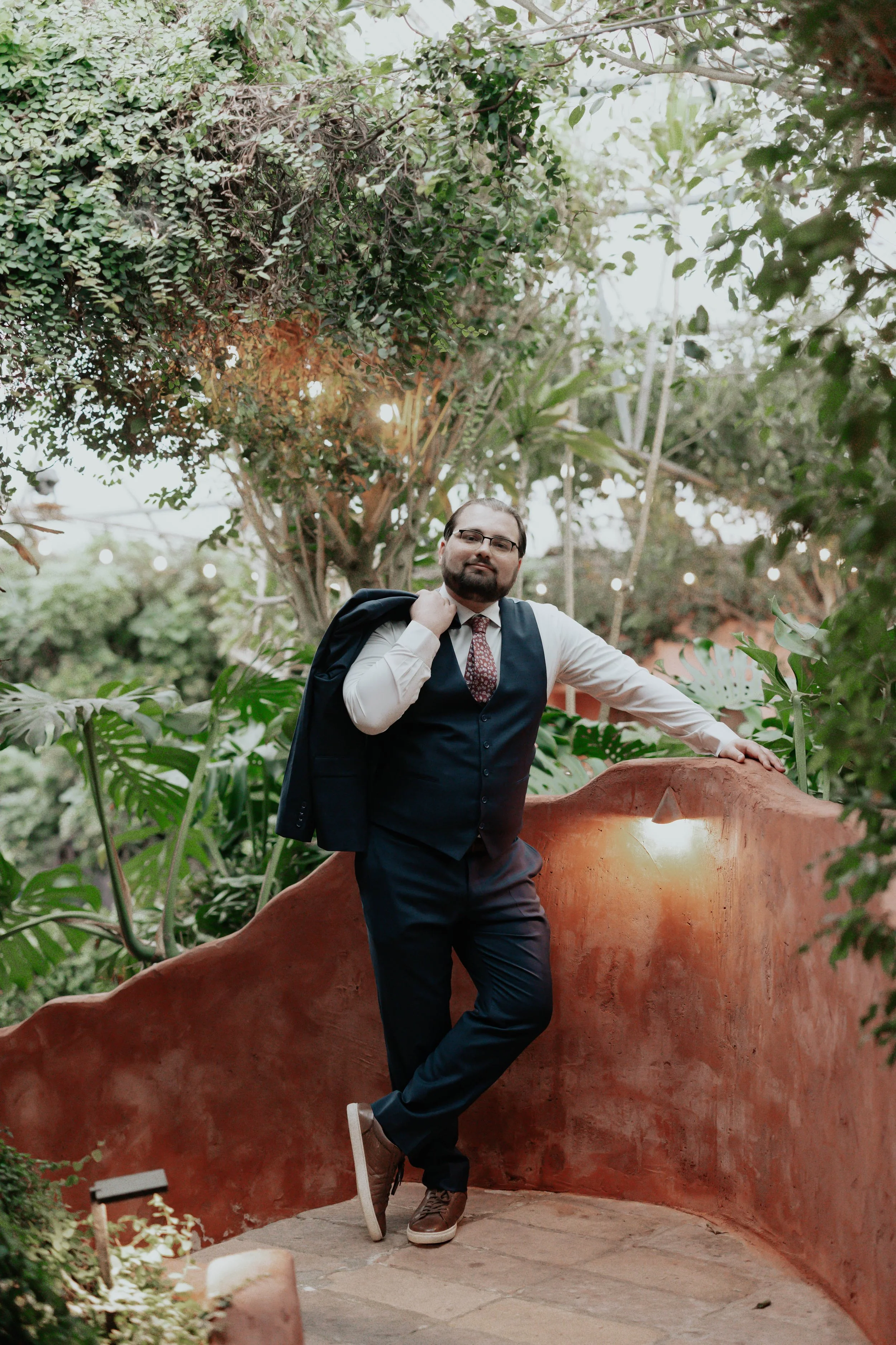 After the ceremony, Lauren and Joel explored the beautiful garden paths and adobe architecture of the Boojum Tree for their wedding portraits. Surrounded by desert greenery and warm Phoenix light, these moments captured the joy and excitement of thei