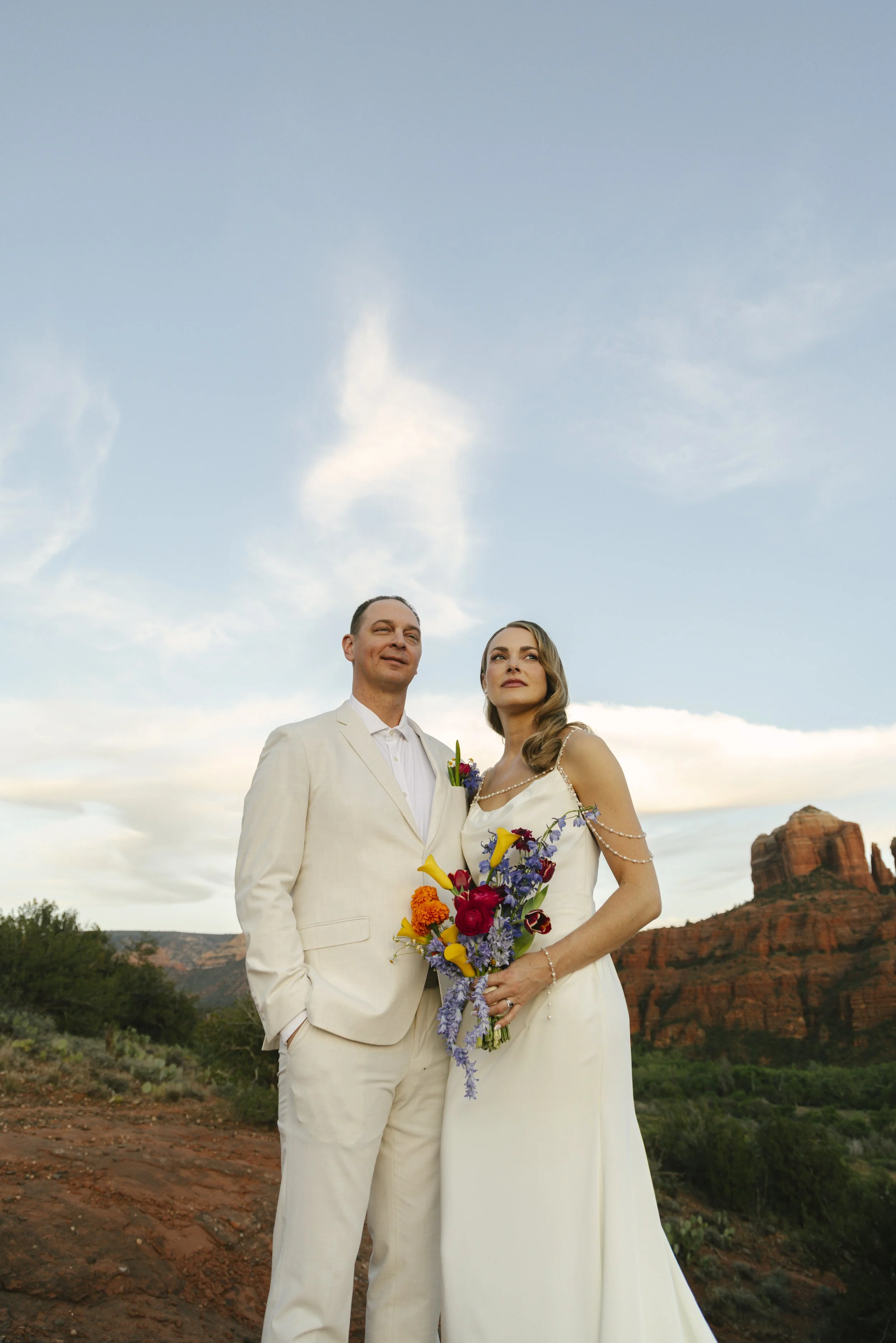 Romantic golden hour portraits at Secret Slick Rock during Chelsea and Travis' intimate Sedona elopement. Featuring Sedona's famous red rock views, stunning Arizona desert landscapes, and timeless wedding photography, these newlywed portraits perfect
