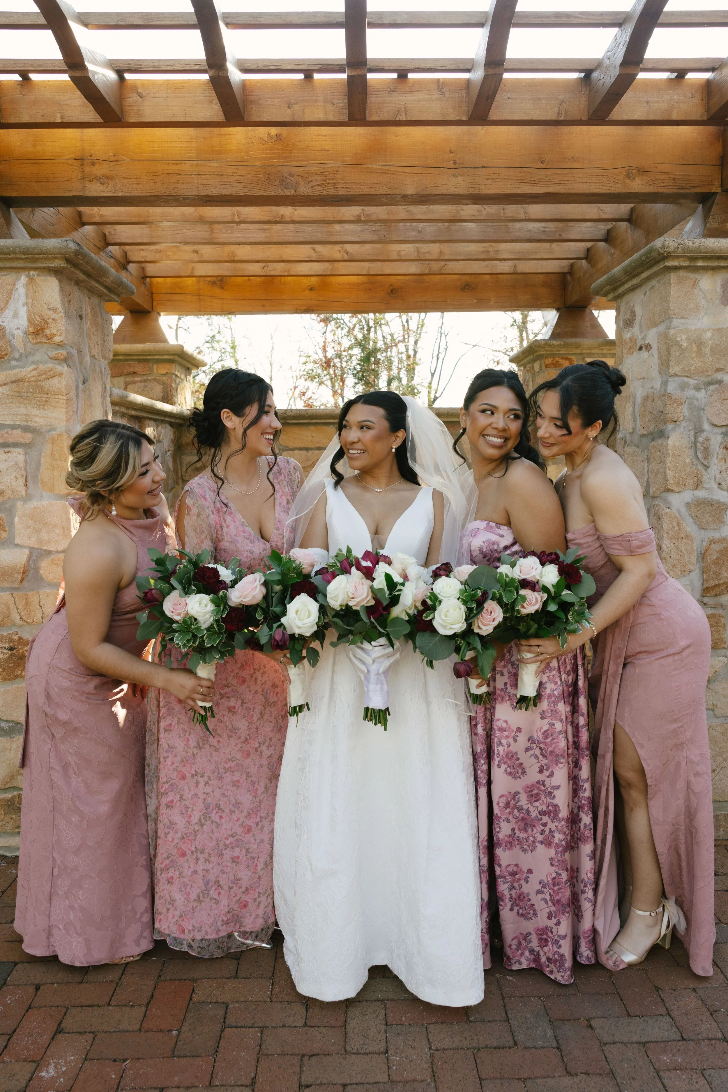 Bridal party portraits at Hotel DuVillage celebrate the bride and groom alongside their closest friends and family. Captured on digital and 35mm film, these images highlight genuine laughter, timeless portraits, and unforgettable moments.