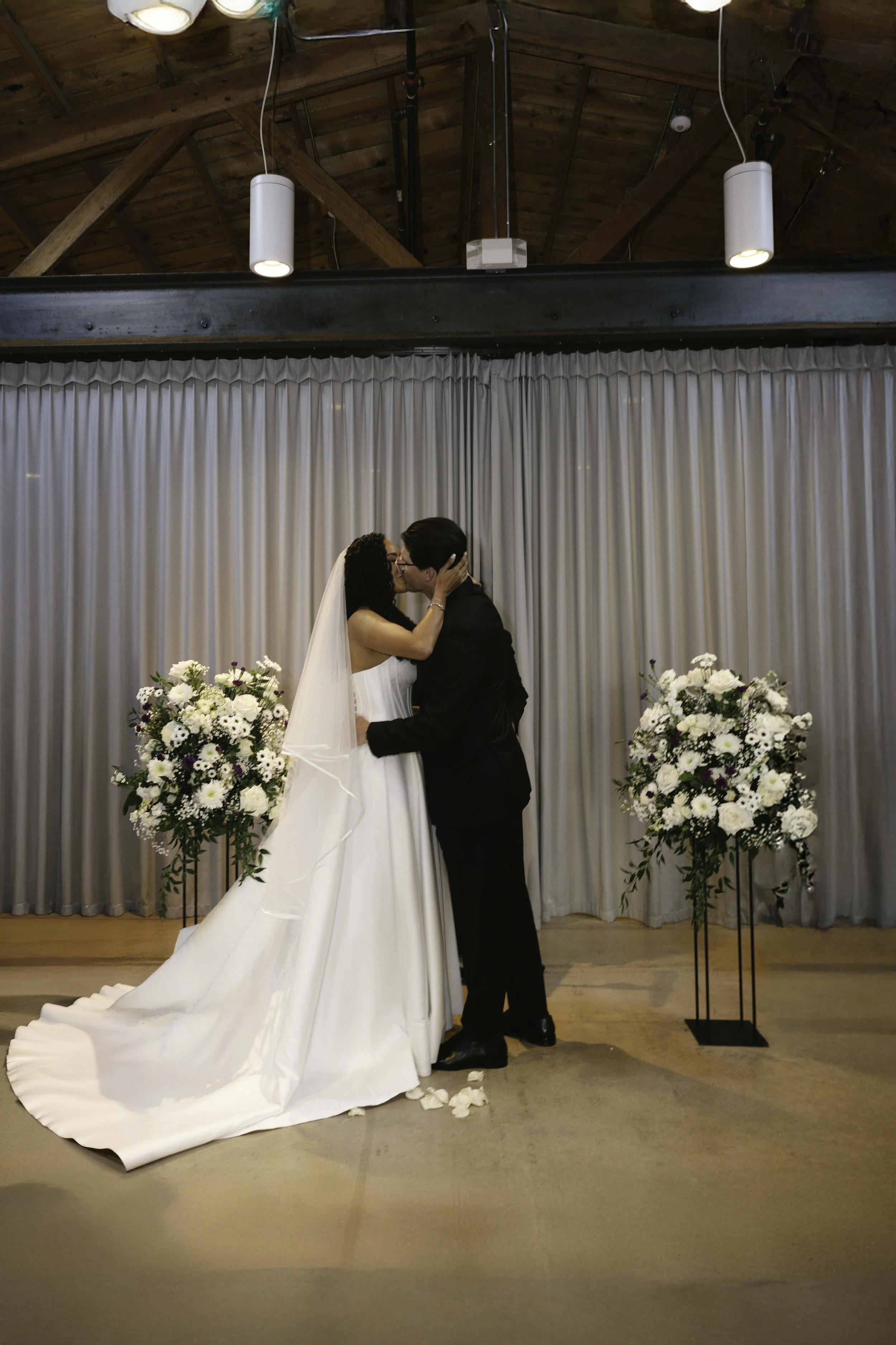Candid wedding photography from a November celebration at The Clayton House in Scottsdale, Arizona, photographed by Raw By Laura, showcasing real emotion, contemporary architecture, and meaningful moments.