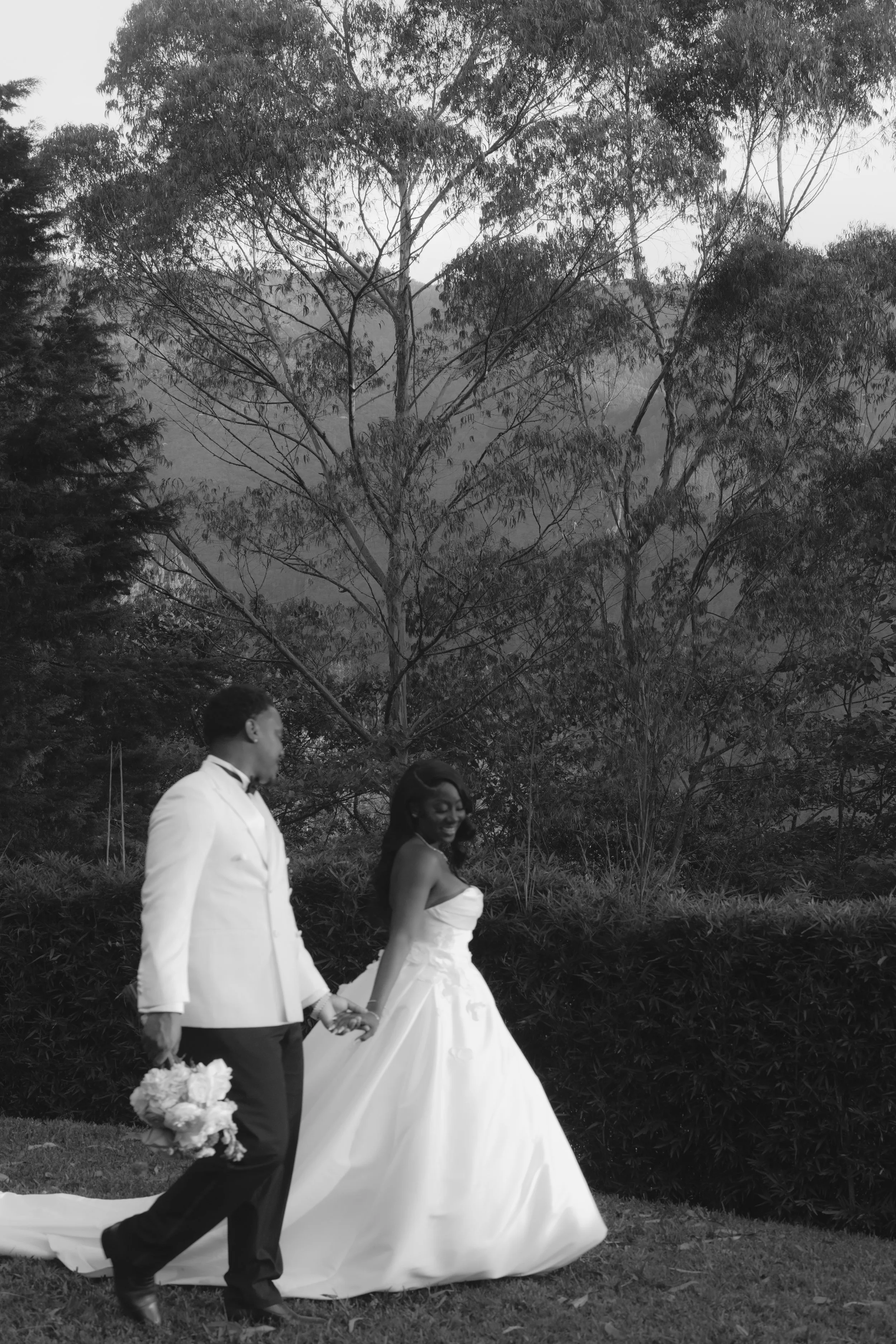Bride and groom portraits at Forest Campestre in Medellín, Colombia featuring romantic destination wedding photography, lush tropical gardens, bridal party portraits, and natural, documentary-style moments.