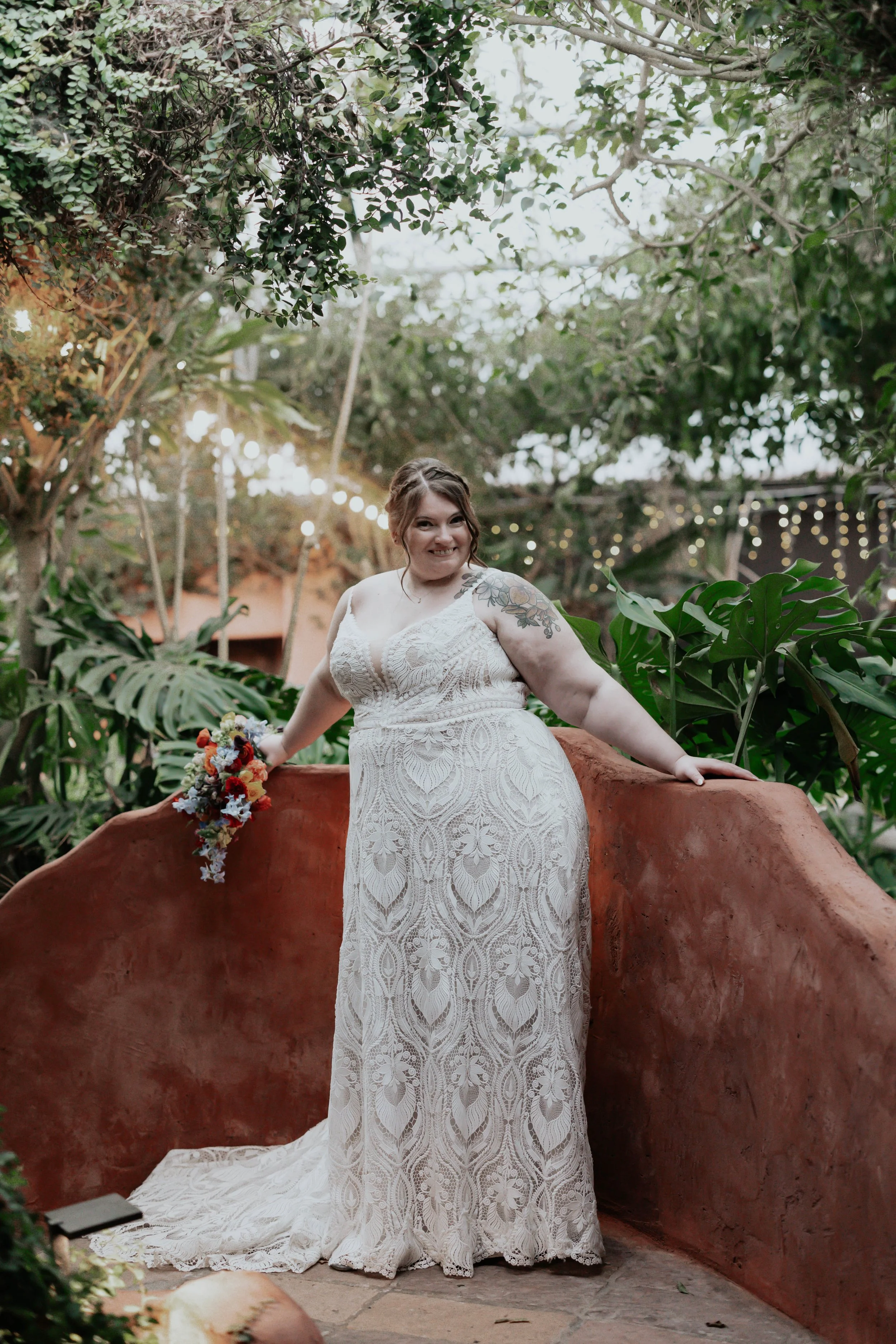 After the ceremony, Lauren and Joel explored the beautiful garden paths and adobe architecture of the Boojum Tree for their wedding portraits. Surrounded by desert greenery and warm Phoenix light, these moments captured the joy and excitement of thei