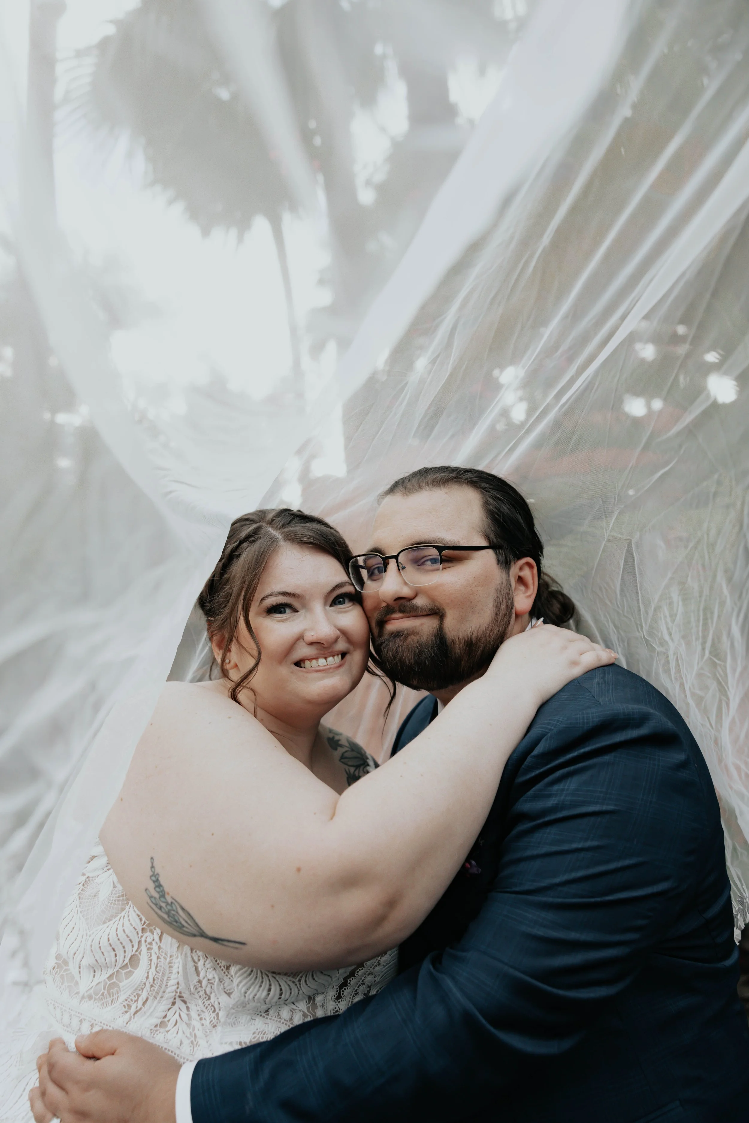 After the ceremony, Lauren and Joel explored the beautiful garden paths and adobe architecture of the Boojum Tree for their wedding portraits. Surrounded by desert greenery and warm Phoenix light, these moments captured the joy and excitement of thei