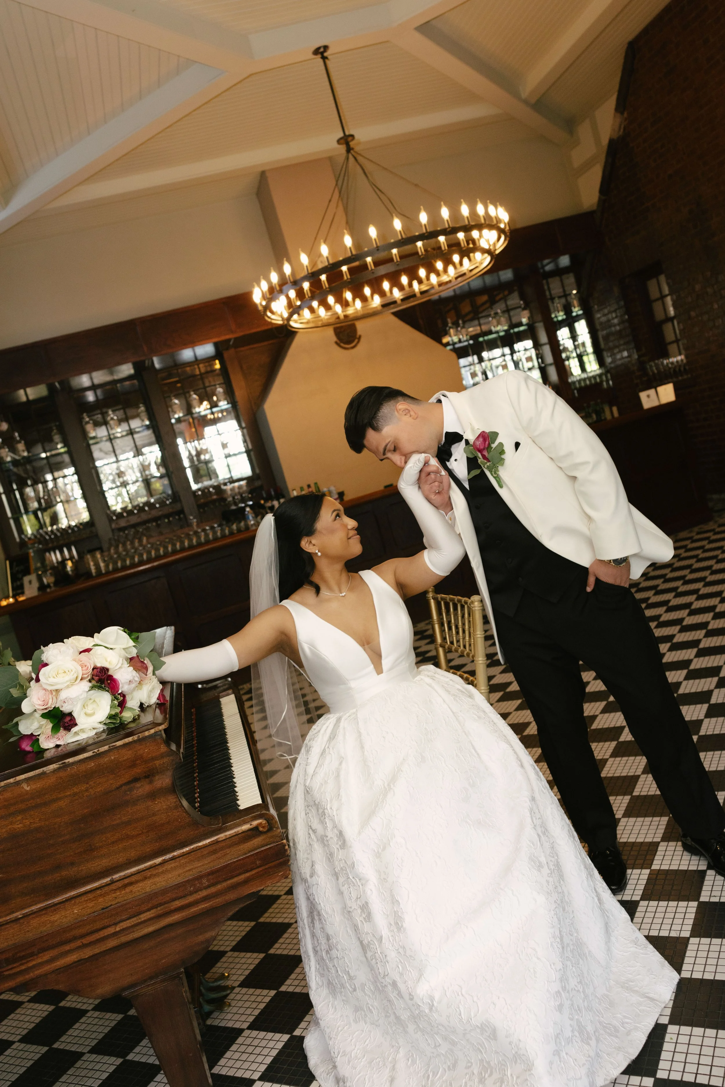 Bride and groom portraits at Hotel DuVillage showcase the venue's picturesque gardens, waterfront views, and timeless charm. Photographed on both digital and 35mm film, these wedding portraits focus on authentic connection, natural movement, and cand