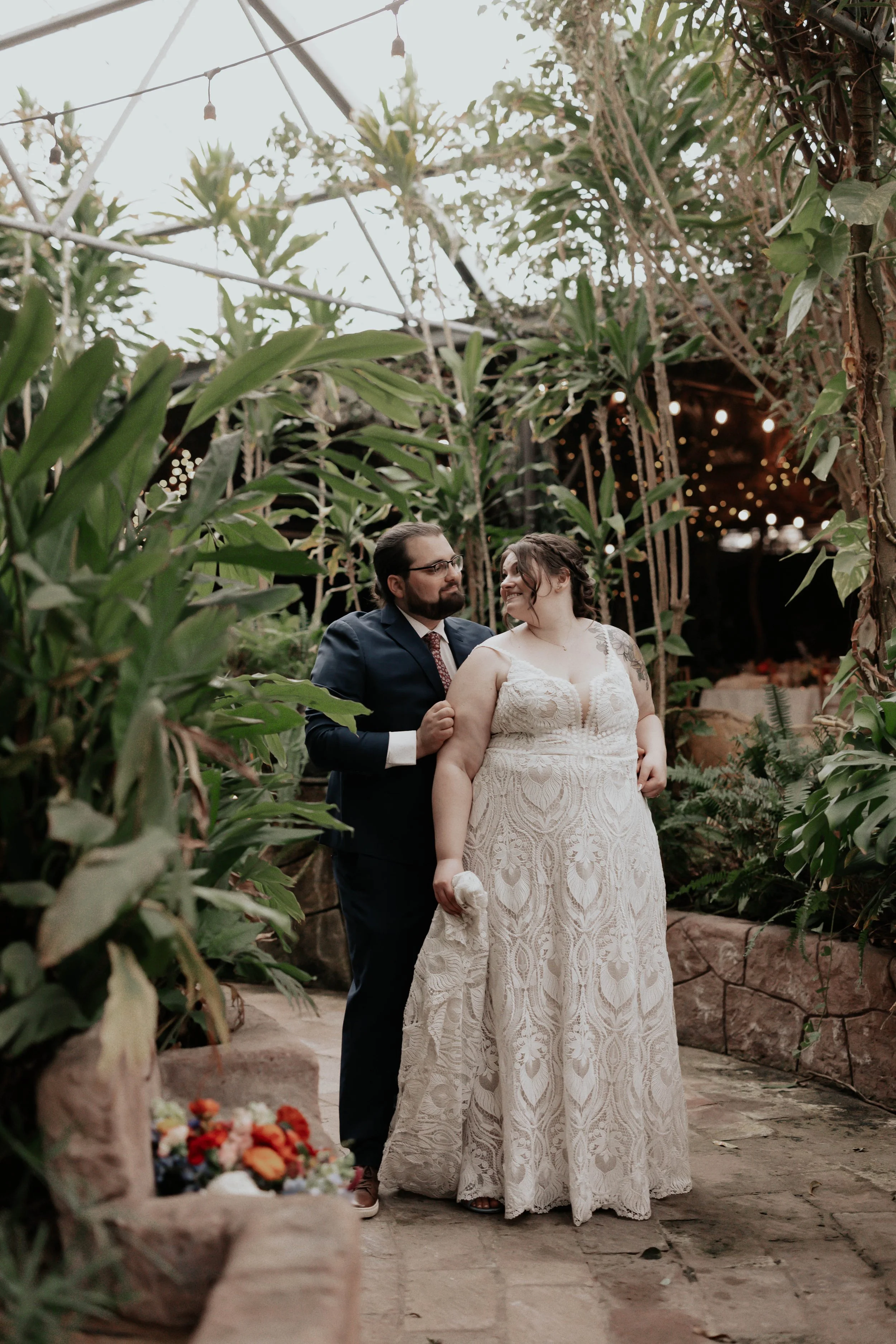 After the ceremony, Lauren and Joel explored the beautiful garden paths and adobe architecture of the Boojum Tree for their wedding portraits. Surrounded by desert greenery and warm Phoenix light, these moments captured the joy and excitement of thei