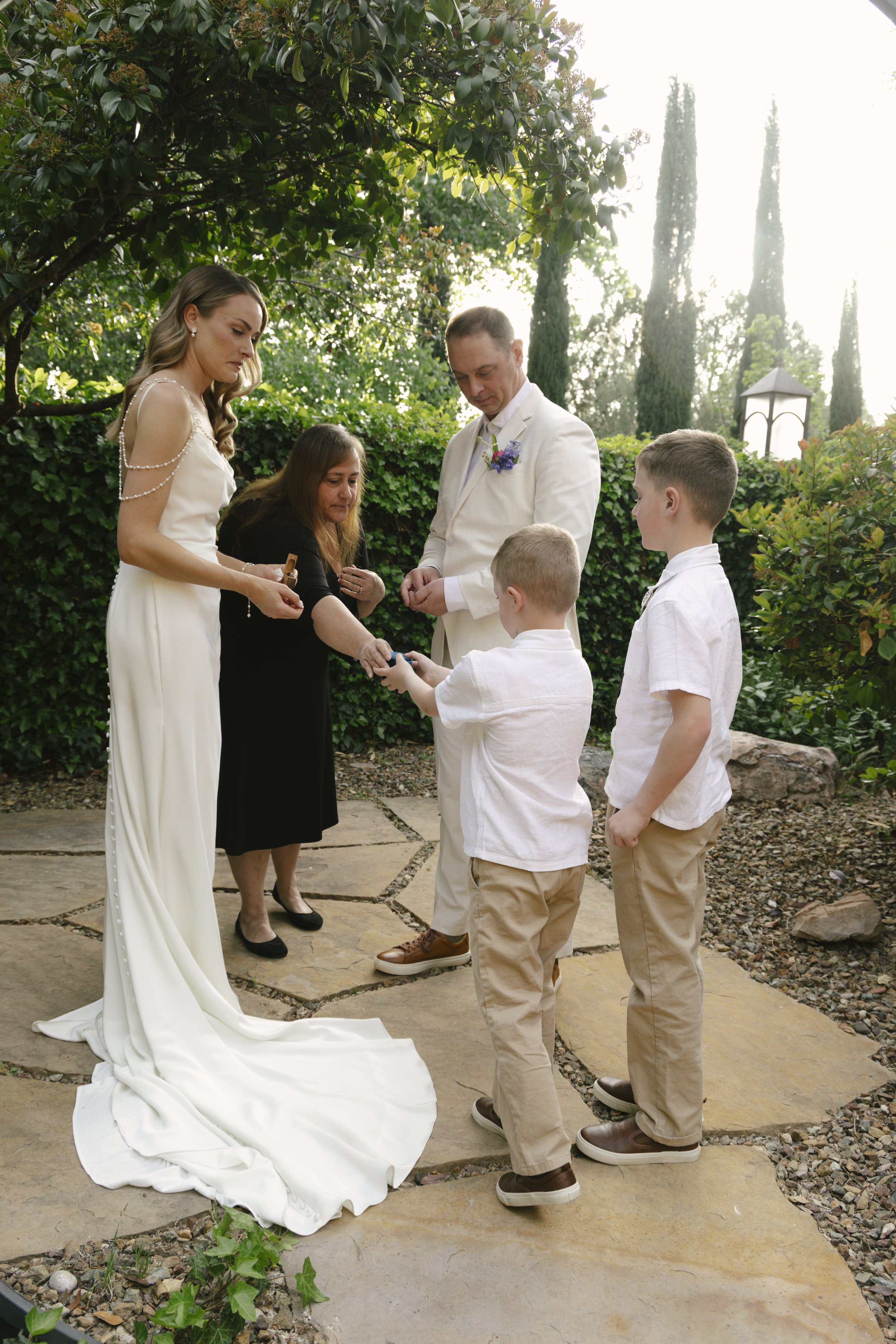 Chelsea and Travis exchanged heartfelt vows during their intimate Sedona elopement at a private Arizona home, surrounded by their closest family, friends, and beloved dog. Their outdoor ceremony was filled with meaningful moments, personal vows, and 