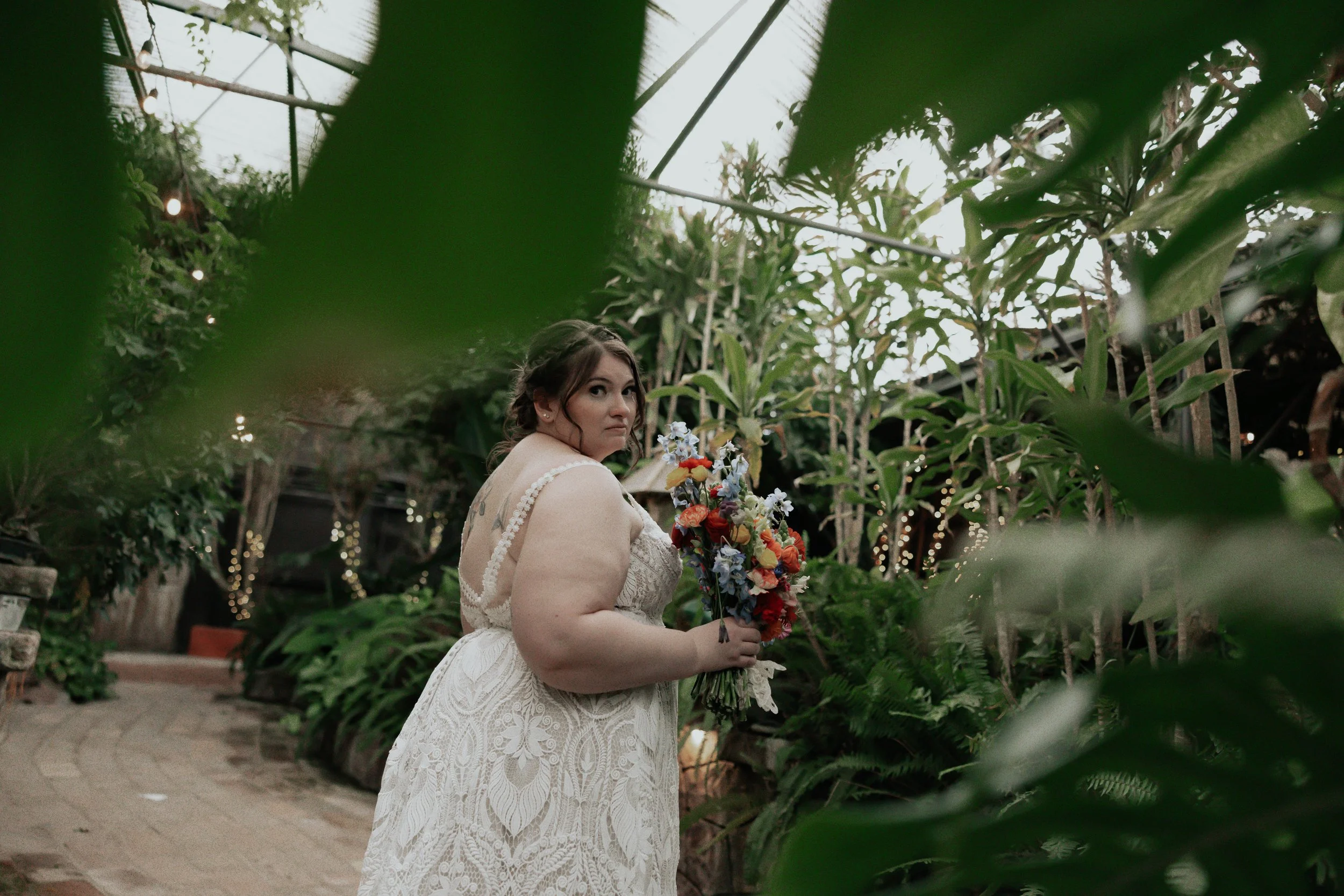 After the ceremony, Lauren and Joel explored the beautiful garden paths and adobe architecture of the Boojum Tree for their wedding portraits. Surrounded by desert greenery and warm Phoenix light, these moments captured the joy and excitement of thei